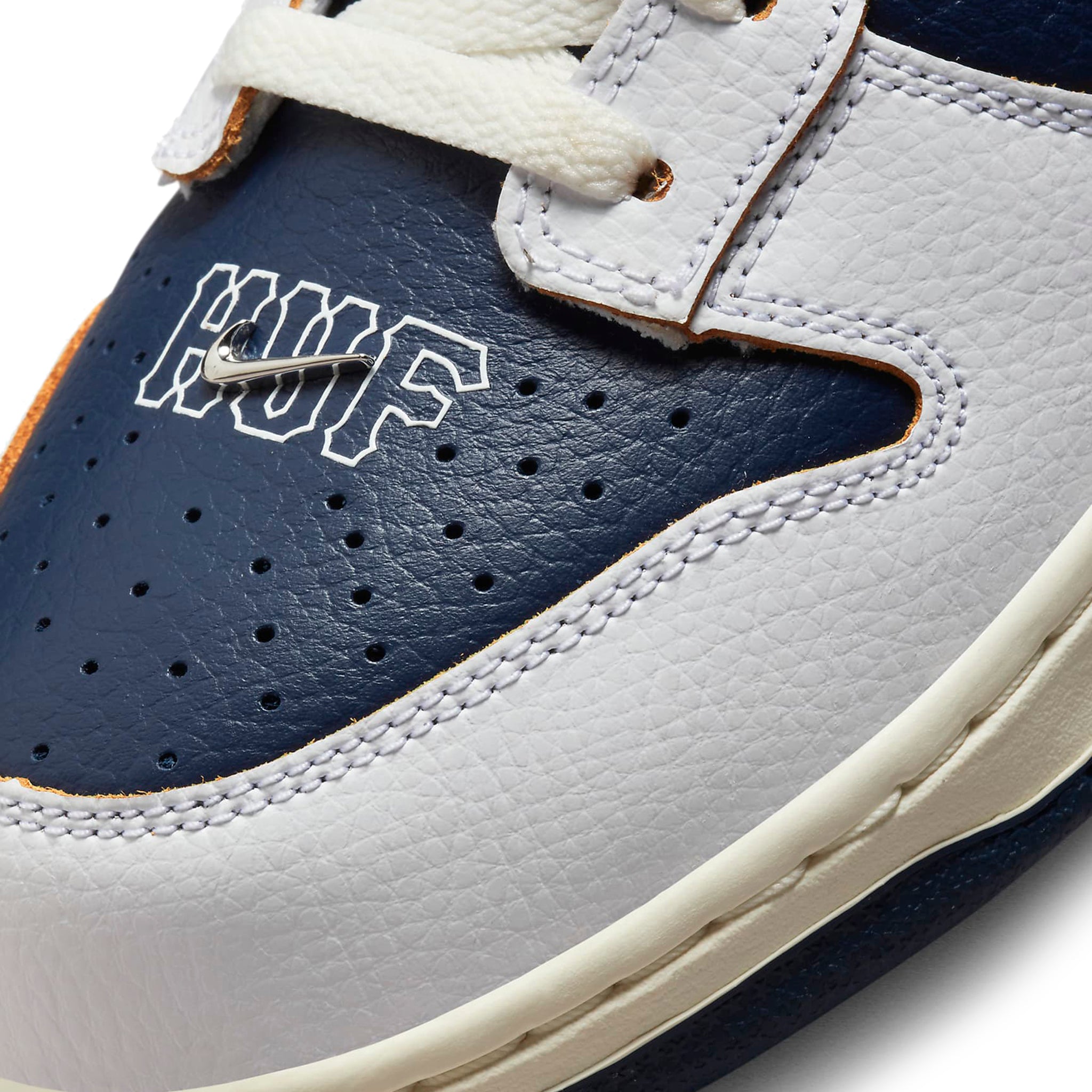 Toe box view of Nike x HUF SB Dunk Low New York City FD8775-100
