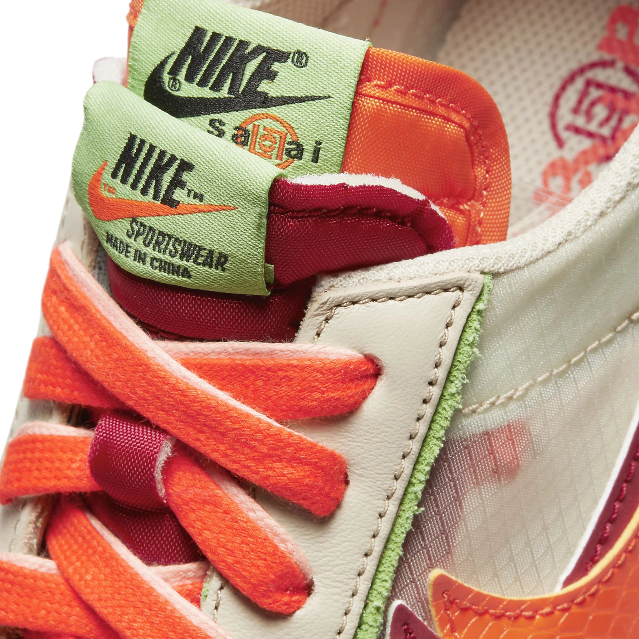 Tongue view of Nike x Sacai LD Waffle CLOT Net Orange Blaze DH1347-100
