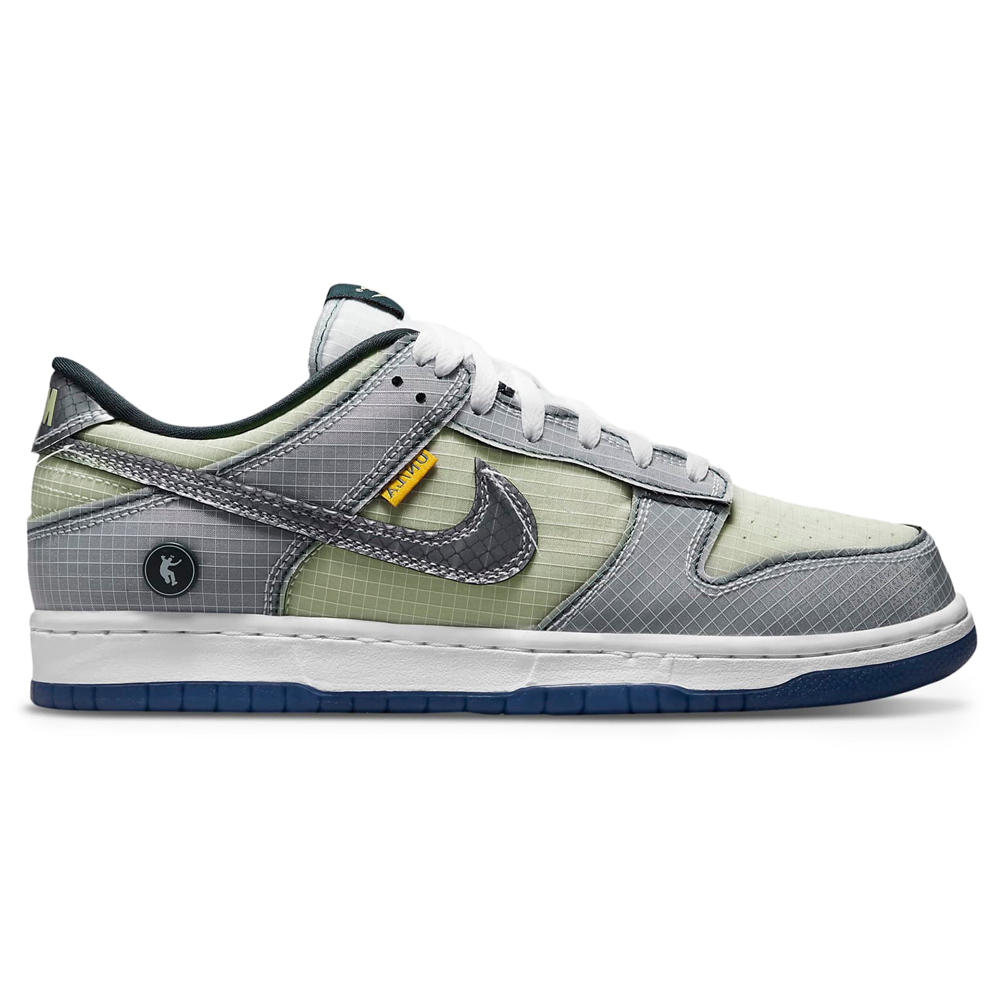 Side view of Nike x Union Dunk Low Passport Pack Pistachio DJ9649-401