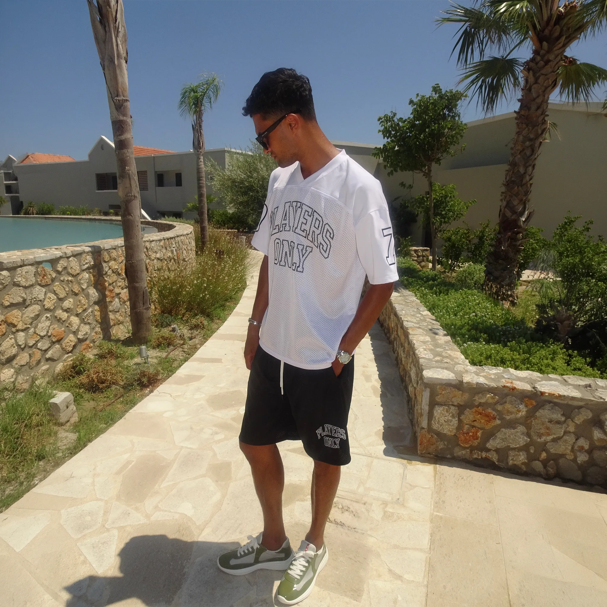 Detailed Side View of Players Only Mesh Black Jersey Shorts