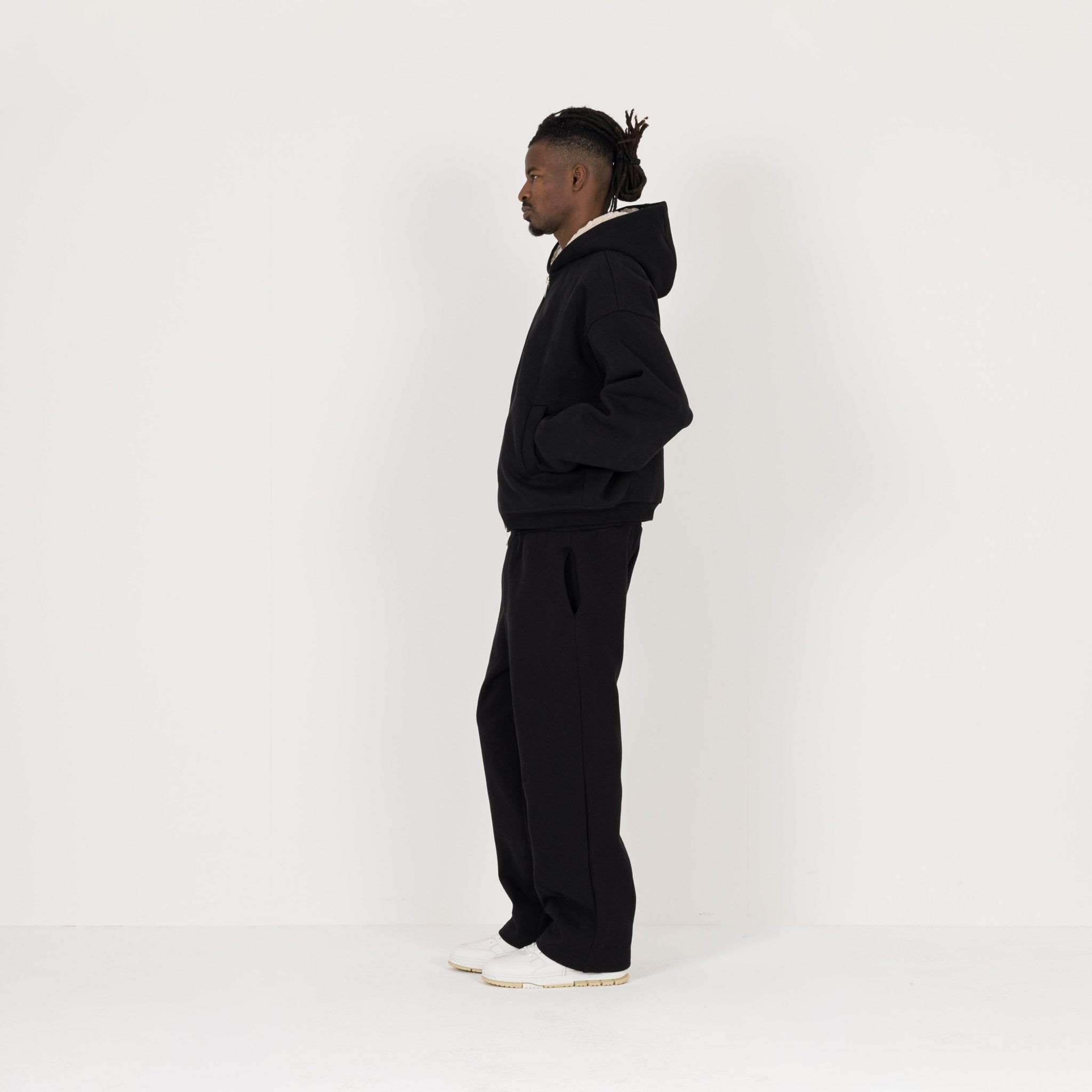 Model Side view of Destructive Sculpt Carbon Black Fleece Jacket