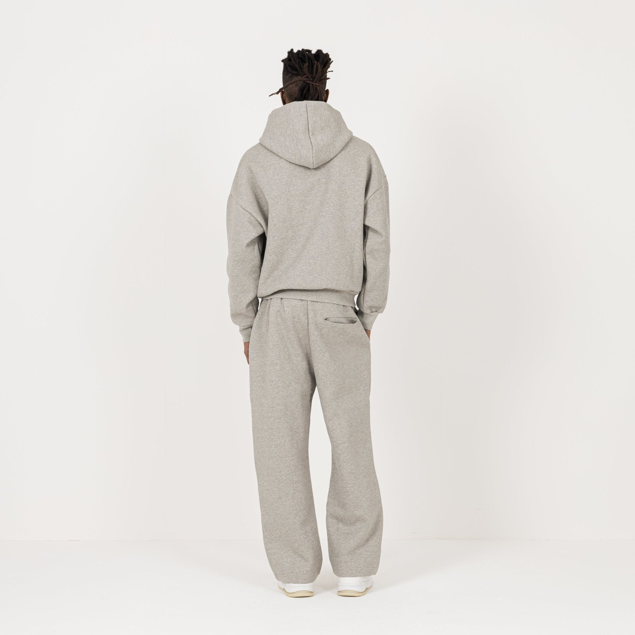 Model Back view of Destructive Sculpt Zip Stone Marl Hoodies