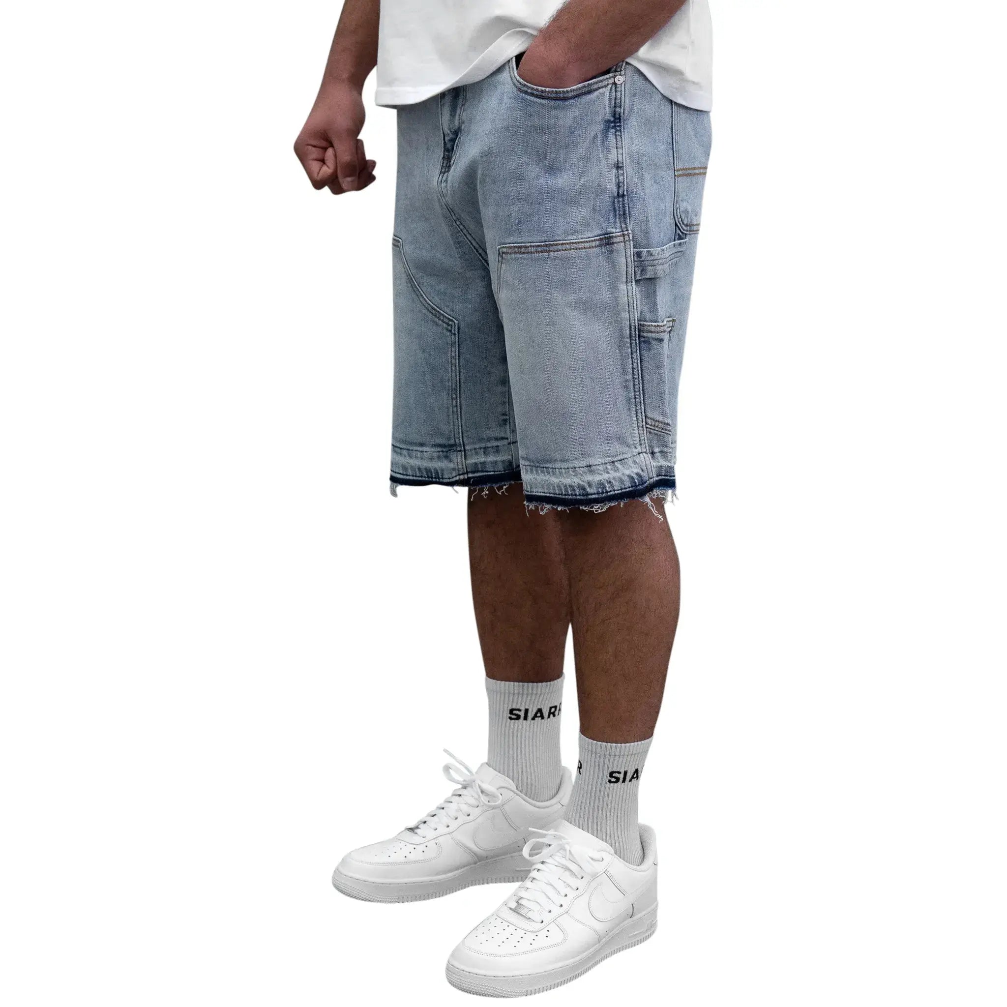 Model side view of SIARR Carpenter Shorts Blue