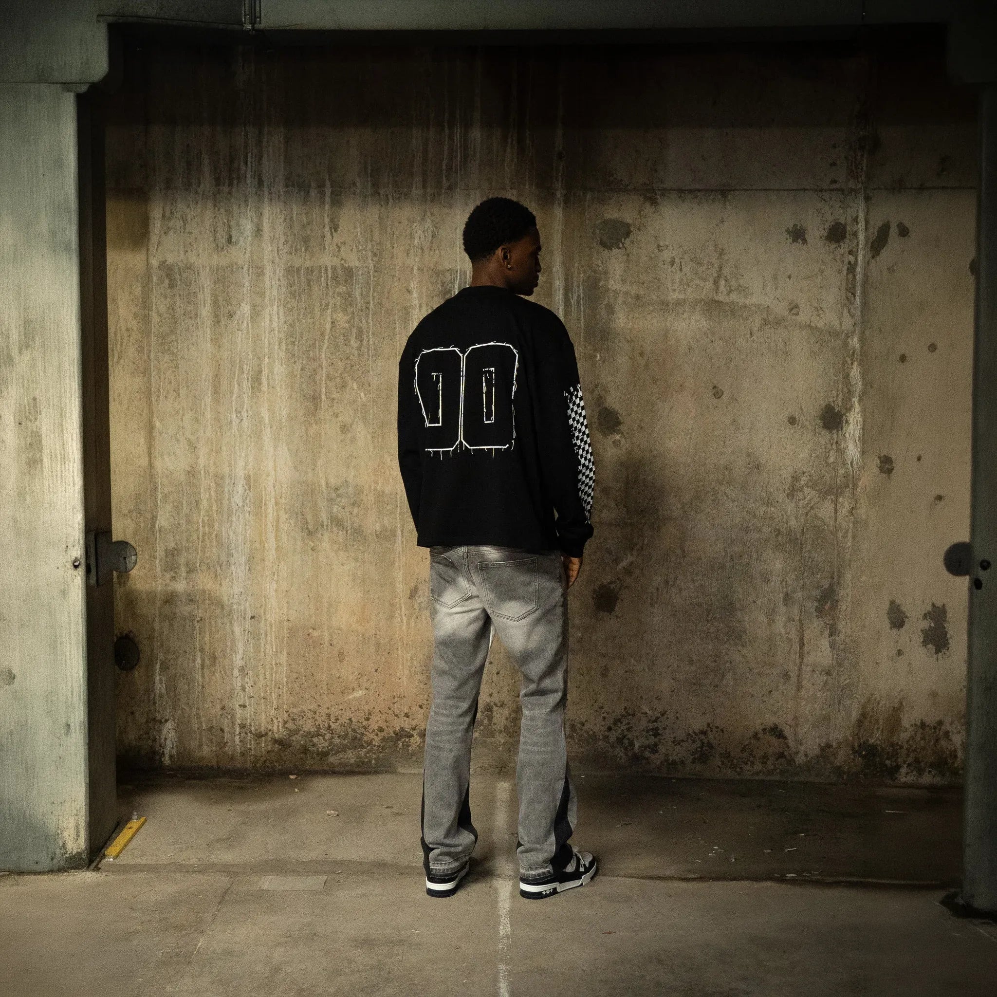 Back View of SIARR Chequered L/S Black T-Shirt