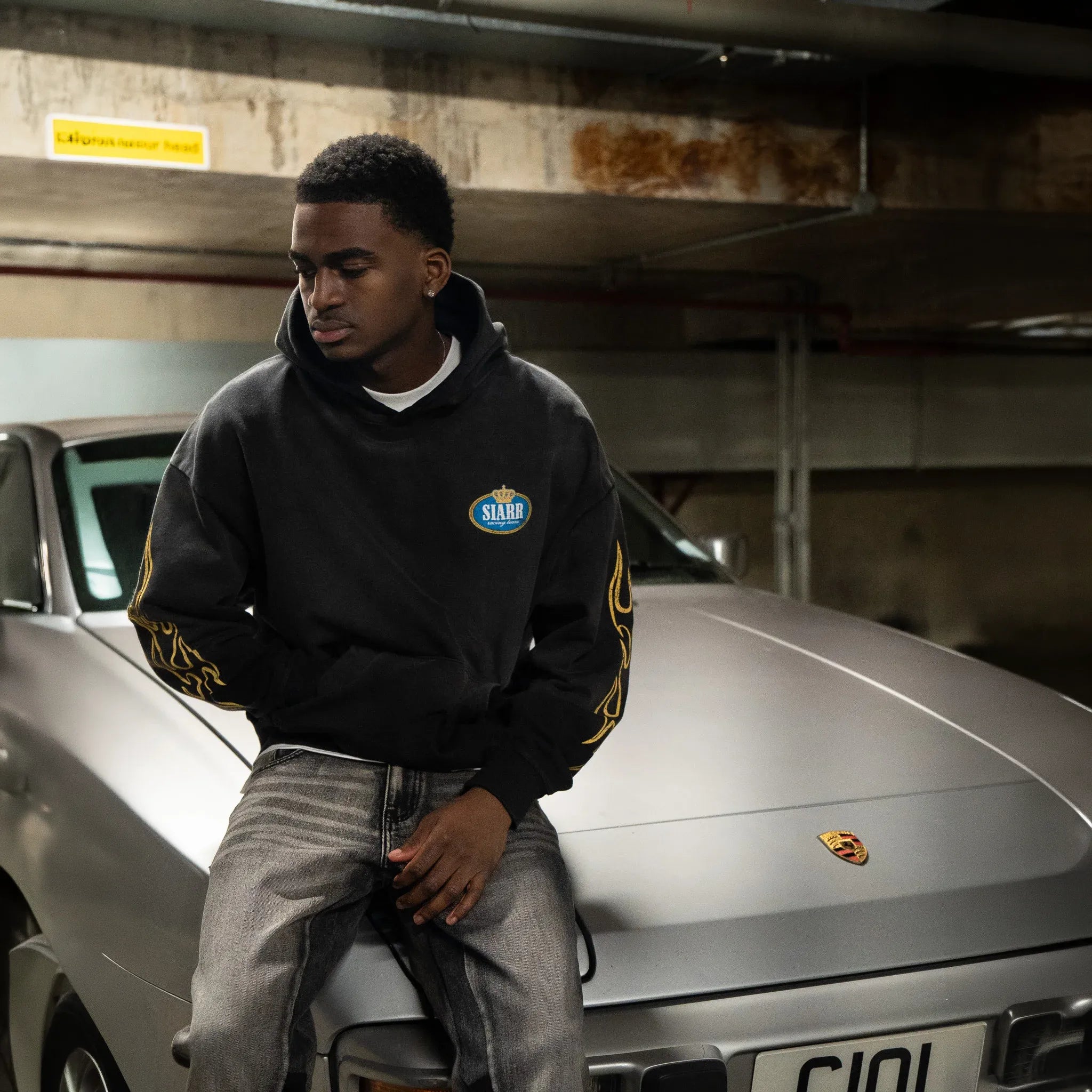 Front View of SIARR Crown Washed Black Hoodie