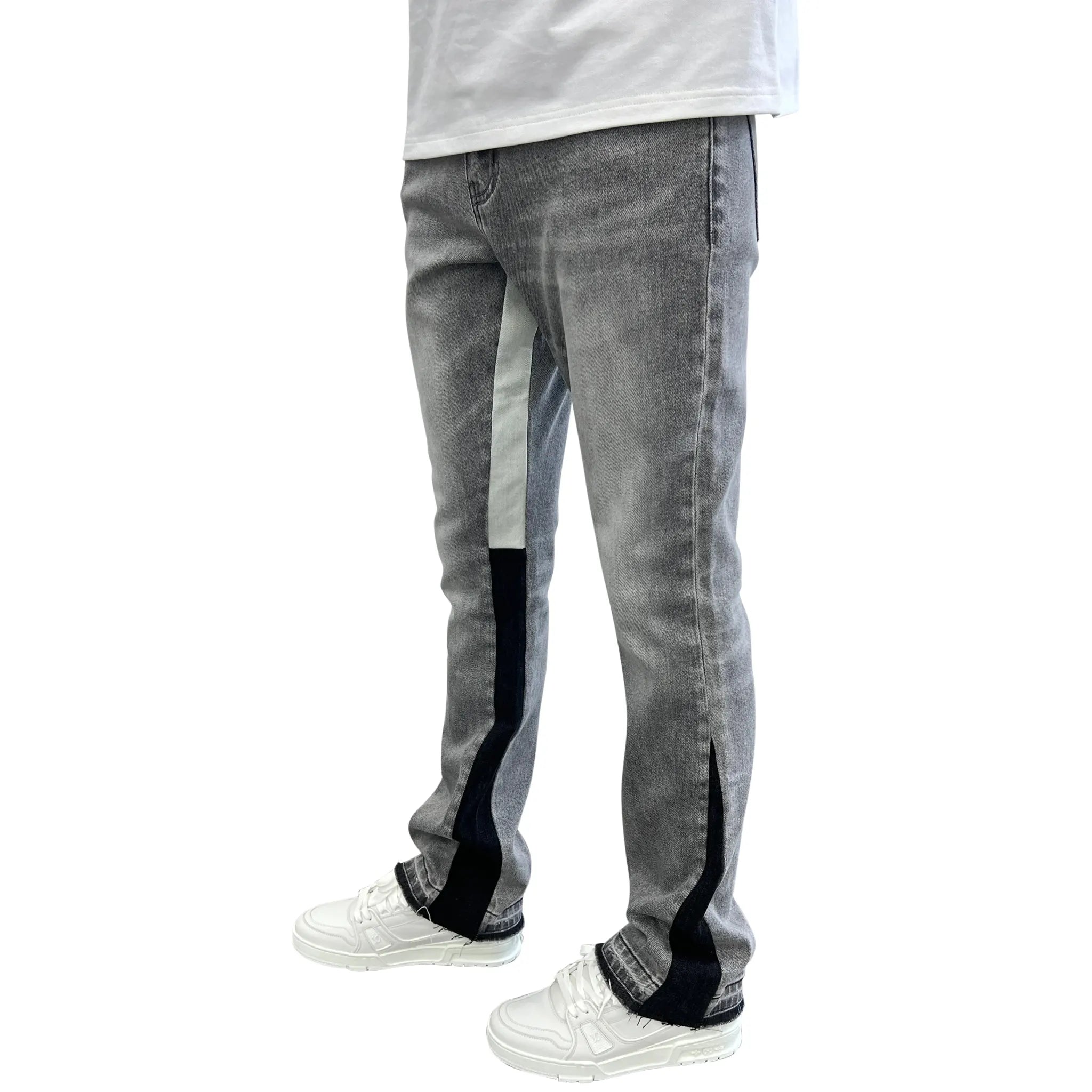 Model Side view of långärmad byxdräkt i jeans