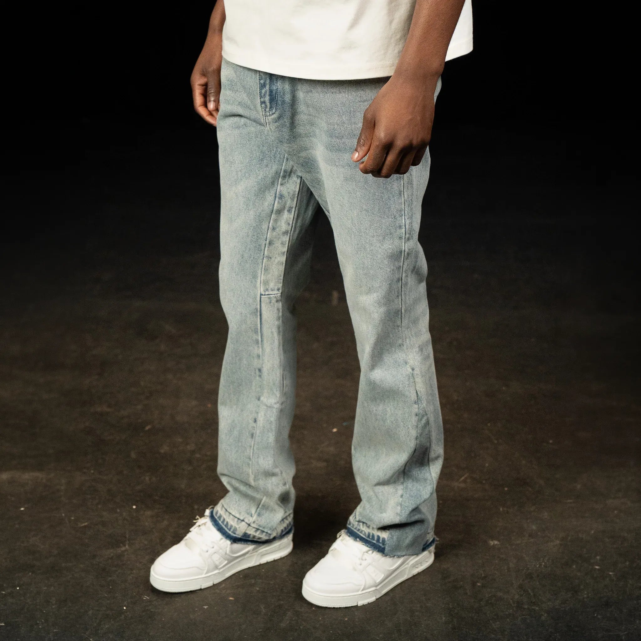 Side View of SIARR Flared Triple Blue Jeans