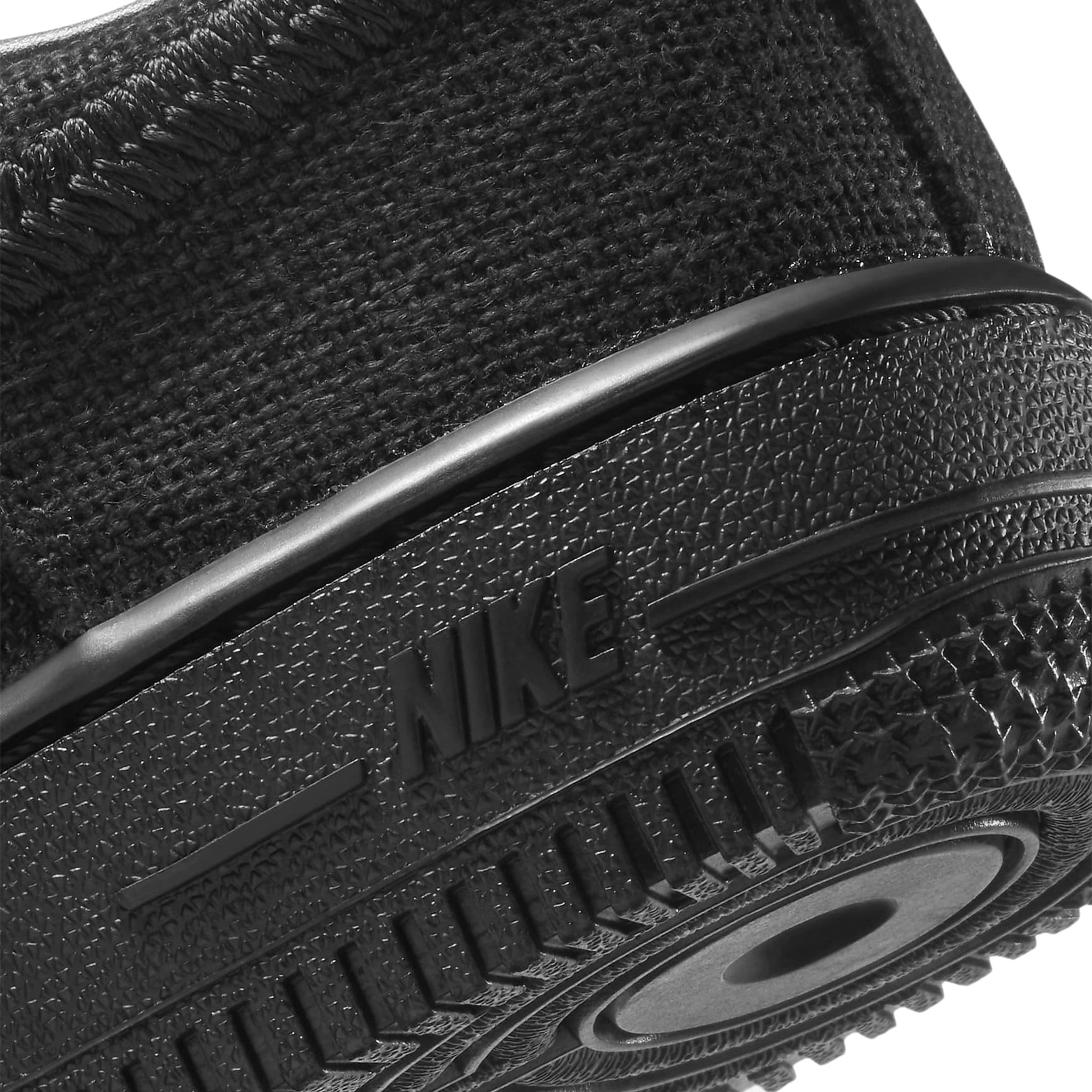 Heel view of Stussy x Nike Air Force 1 Low Black (PS) DD1578-001