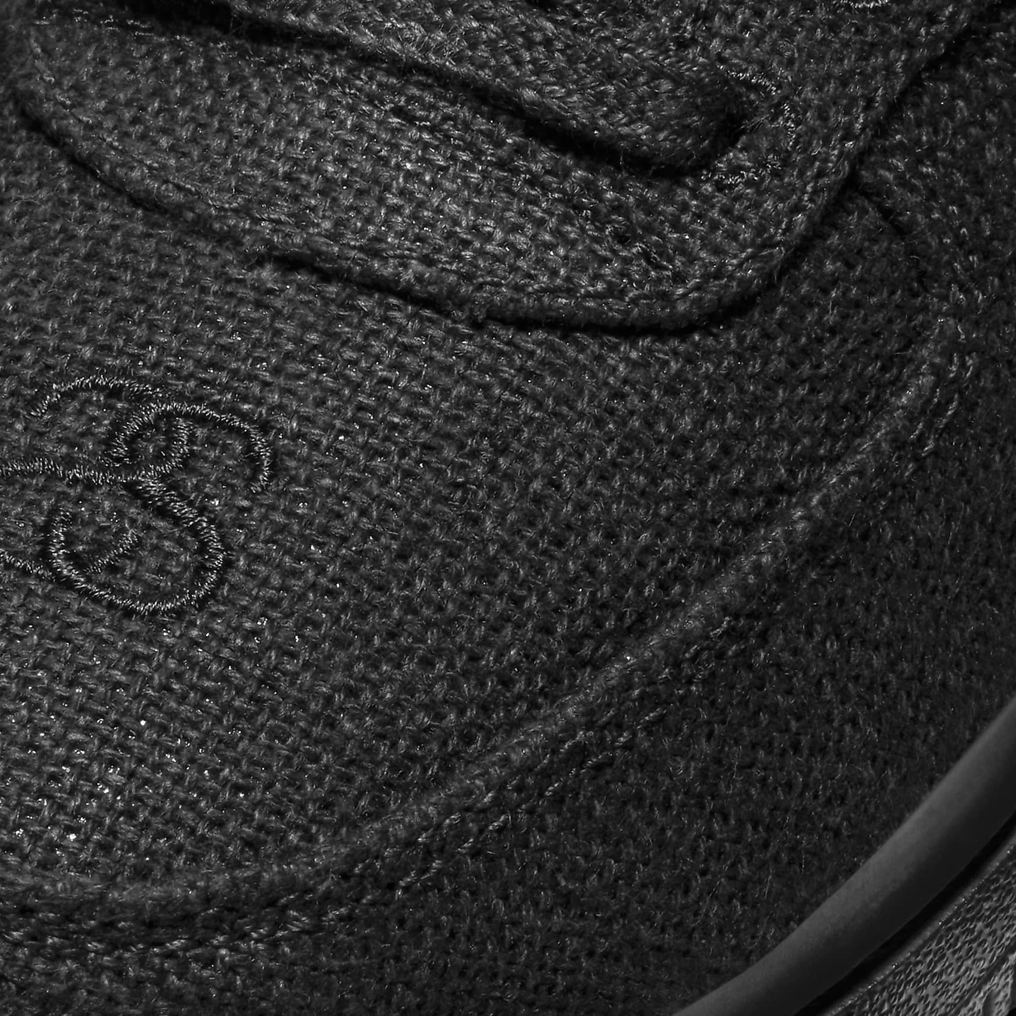 Toe view of Stussy x Nike Air Force 1 Low Black (PS) DD1578-001