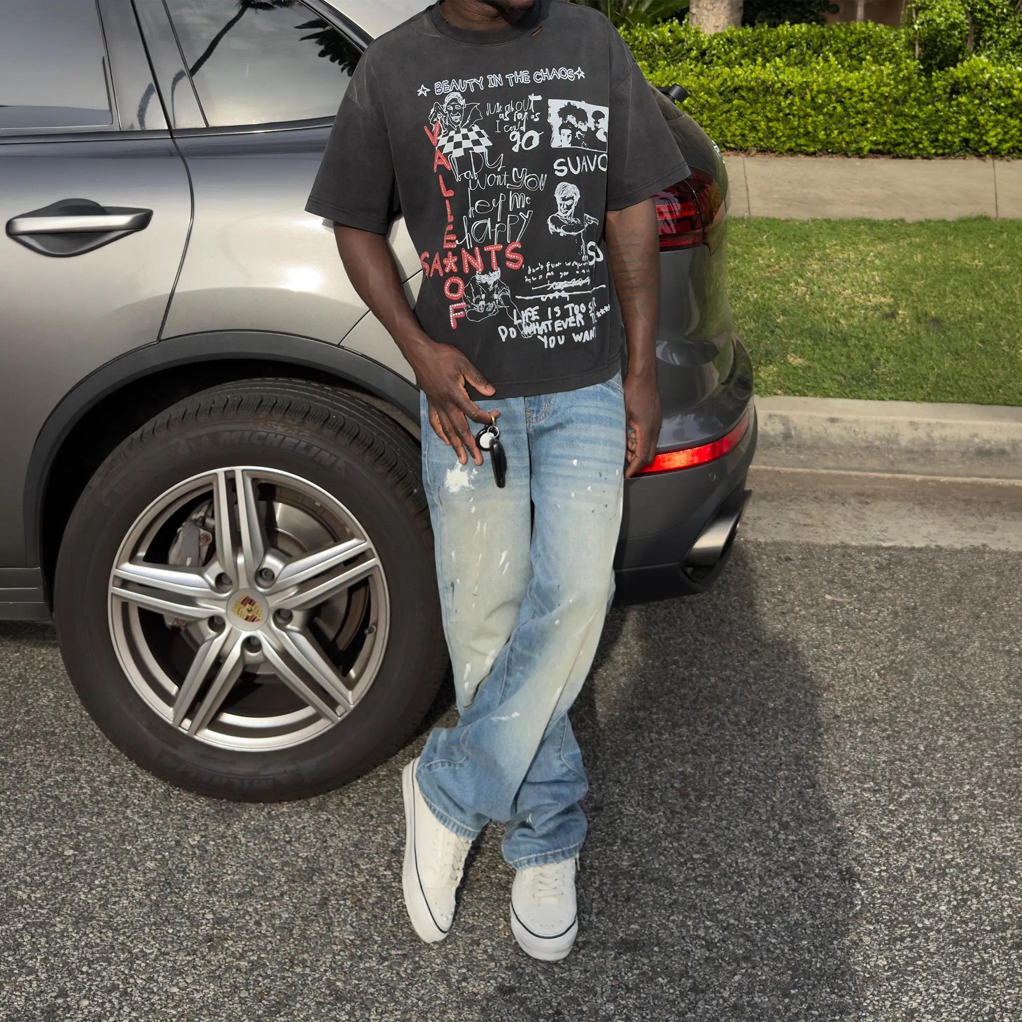 Model View of Suavo World Valley Of Saints Vintage Black T-Shirt