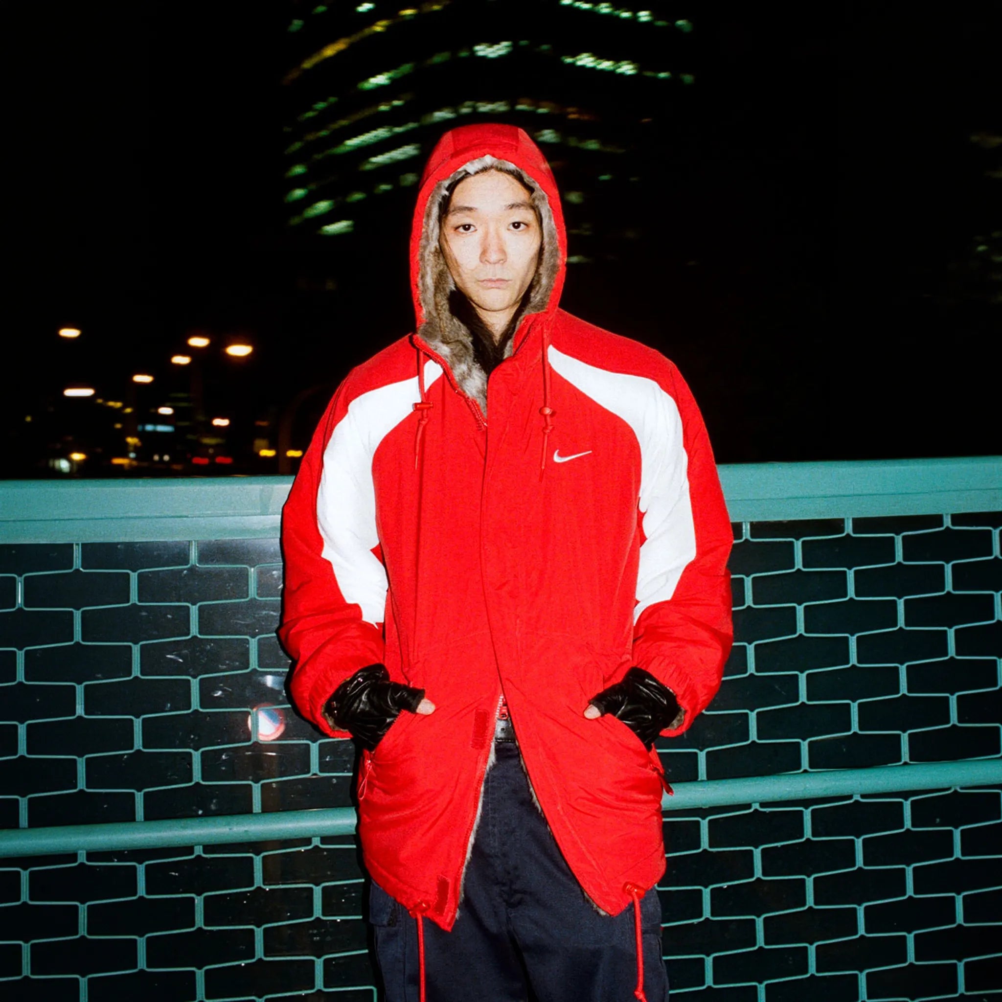 Front View of Supreme x Nike Faux Fur Reversible Parka Jacket FW26J1 RED