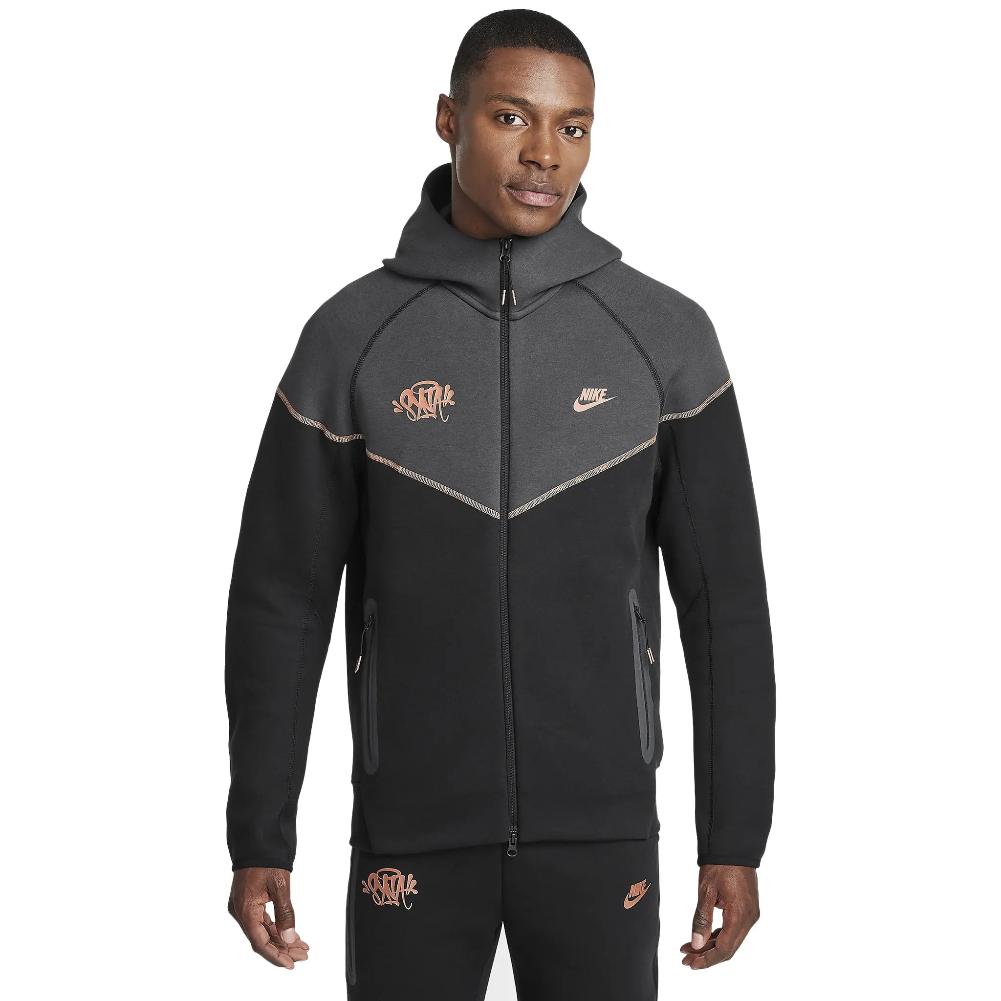 Model full view of Syna World x Nike Central Cee Tech Fleece Black Tracksuit HQ3748-010 | HQ3749-010