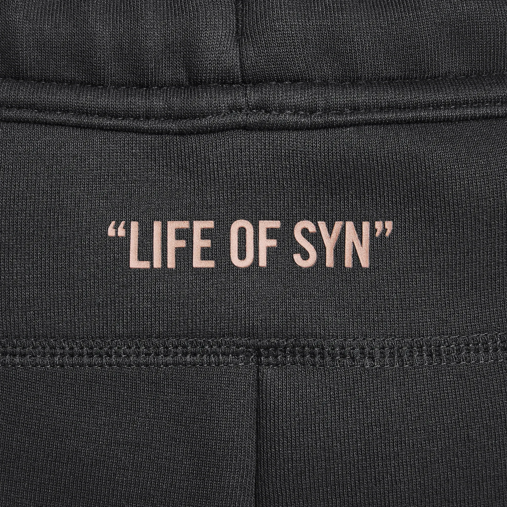 Pants logo view of Syna World x Nike Central Cee Tech Fleece Black Tracksuit HQ3748-010 | HQ3749-010