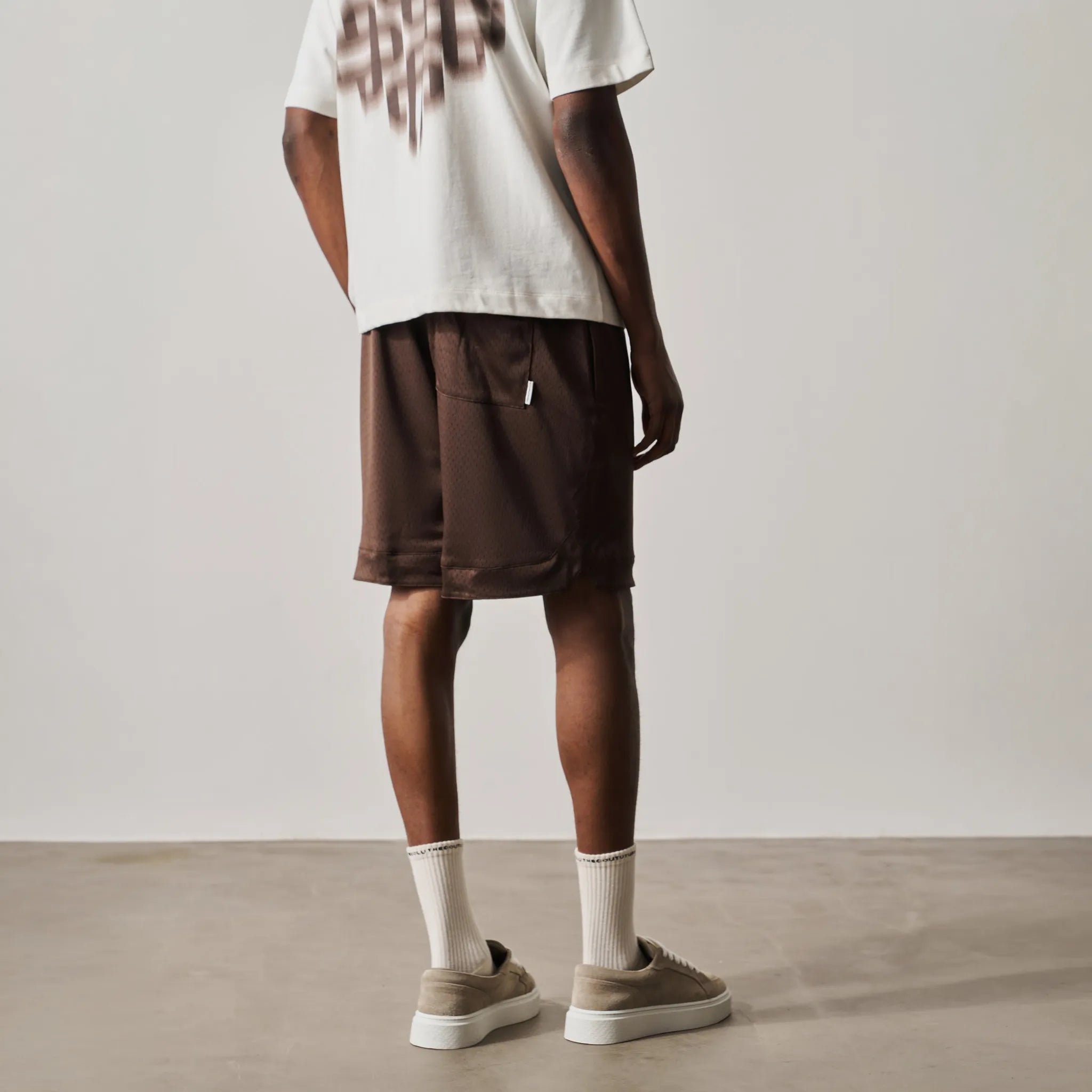 Back Side View of The Couture Club Airtex Brown Shorts