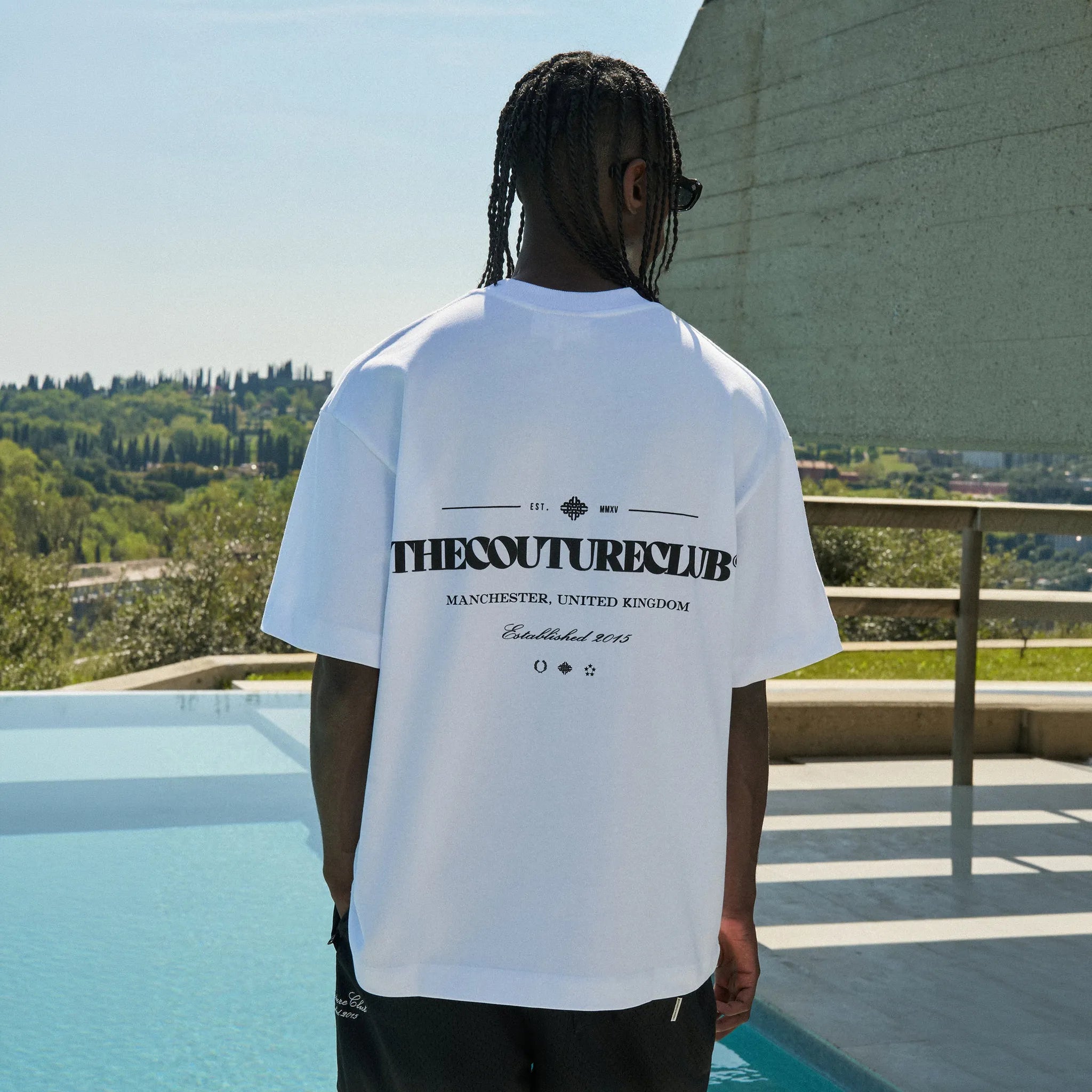 Back View of The Couture Club Copyright Multi Graphic White T-Shirt