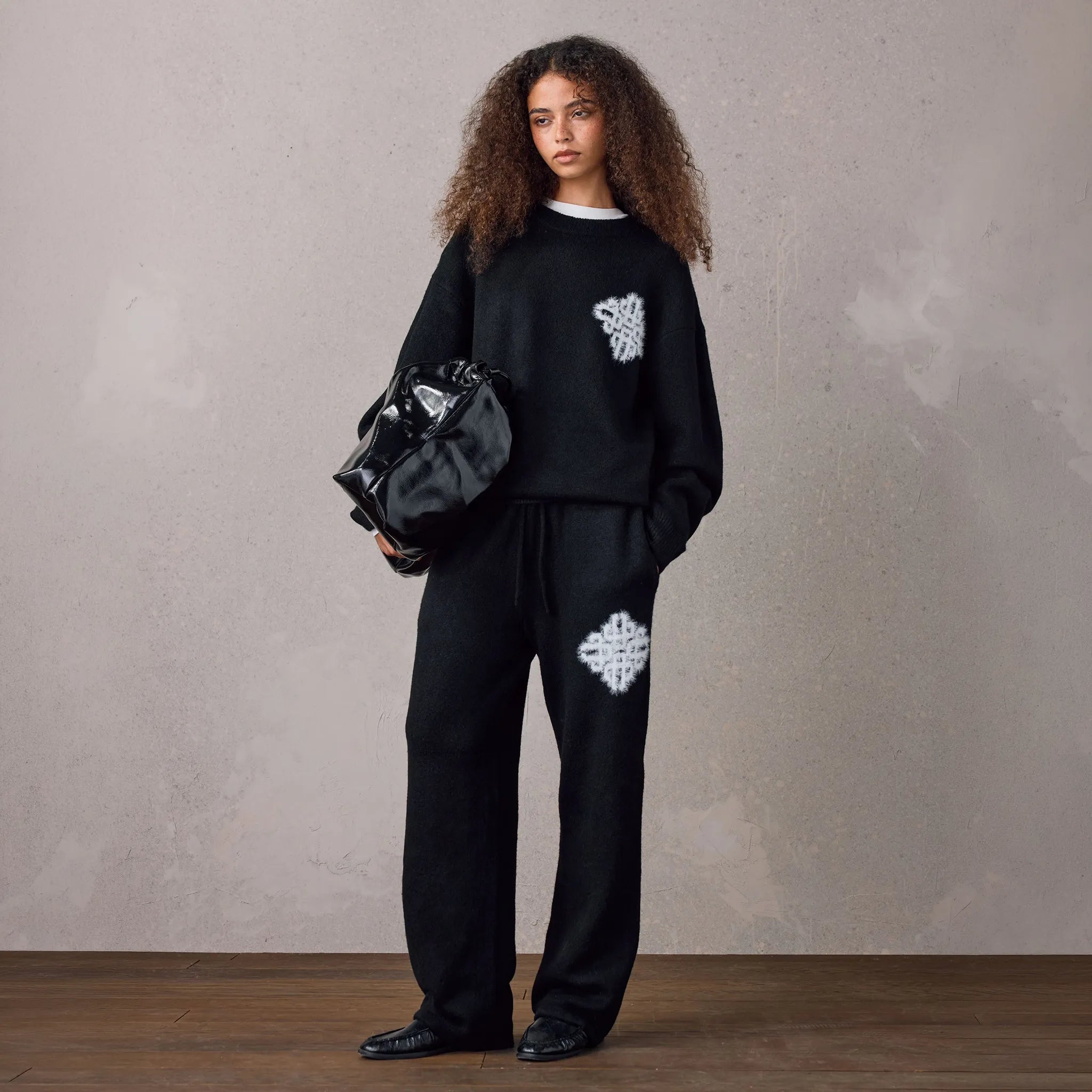 Detailed Front View of The Couture Club Emblem Fluffy Knit Black Sweatshirt