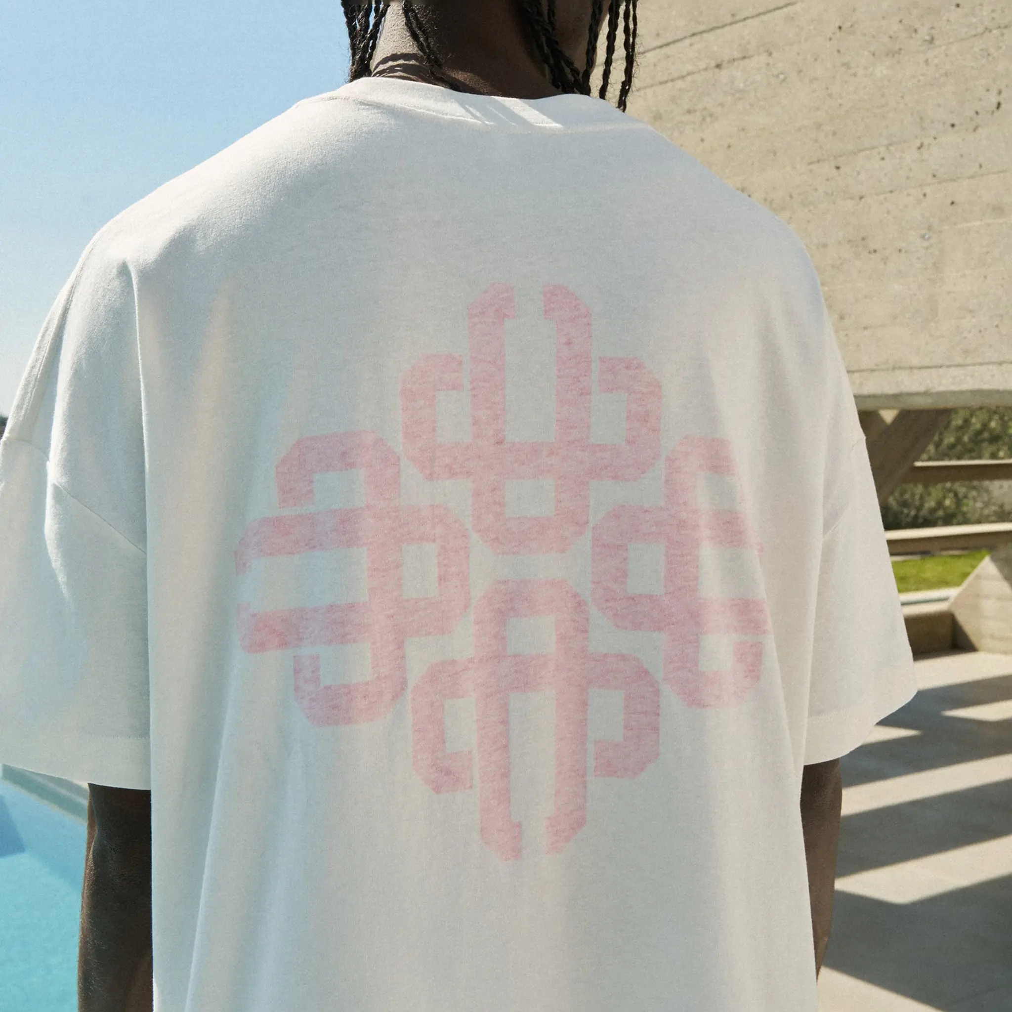 Back View of The Couture Club Emblem Reverse Print Pink T-Shirt