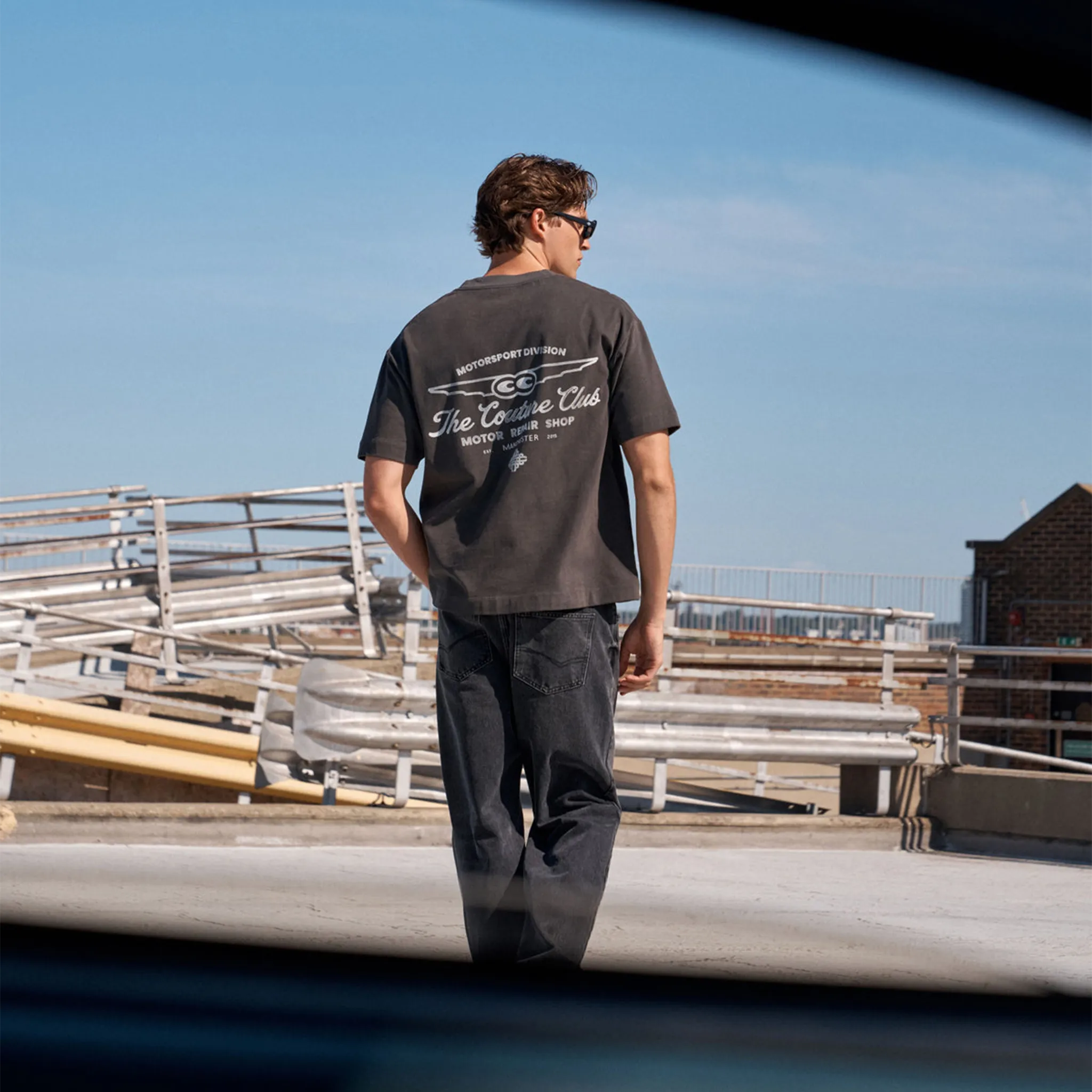 Back View of The Couture Club Motor Repair Shop Graphic Charcoal White T-Shirt