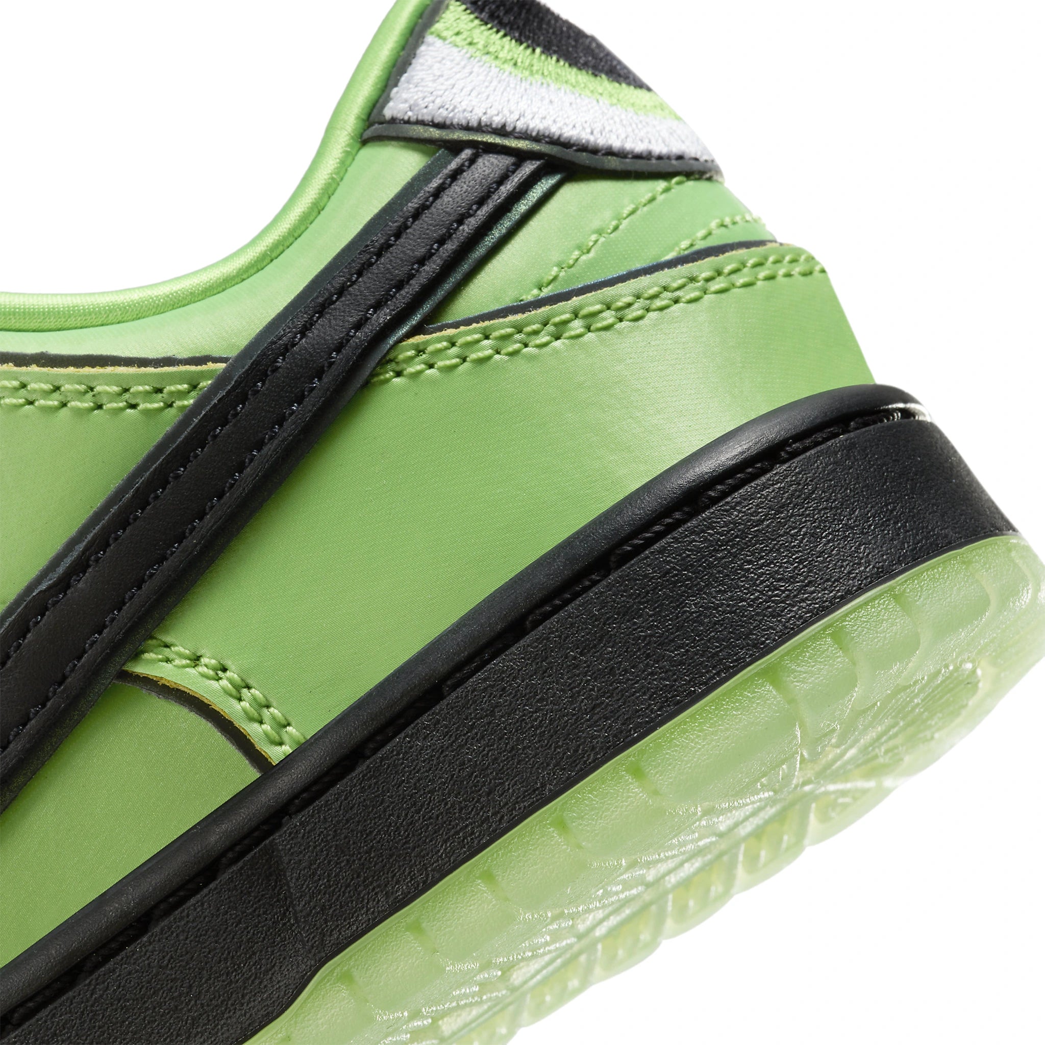 Heel logo view of The Powerpuff Girls x Nike SB Dunk Low Buttercup (PS)