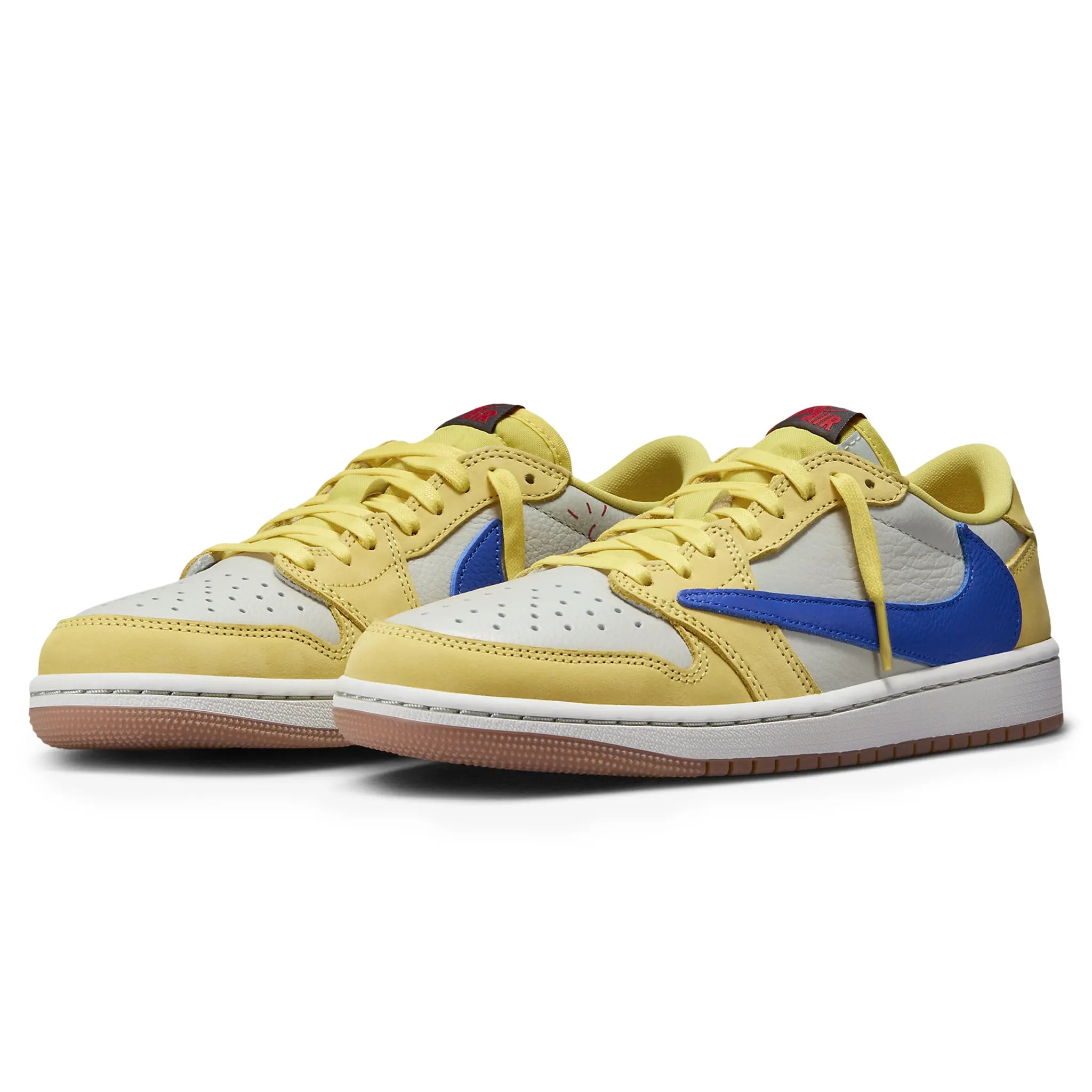 Pair view of Travis Scott x Air Jordan 1 Retro Low OG Canary (W) DZ4137-700