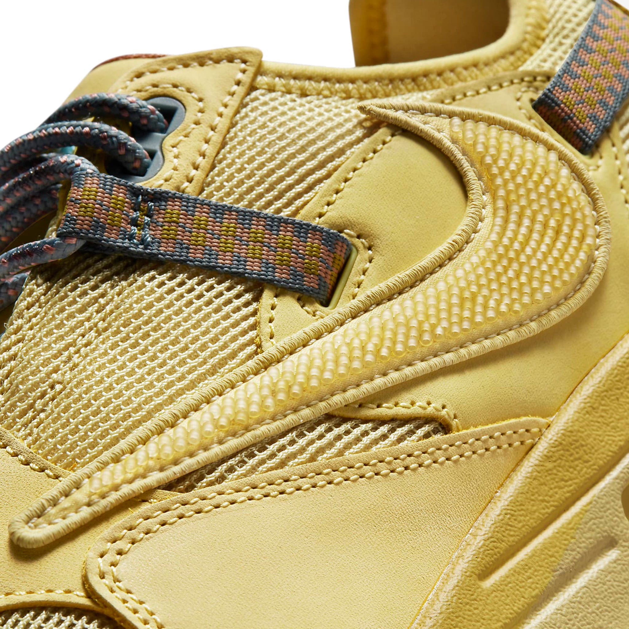 Logo view of Travis Scott x Nike Air Max 1 Saturn Gold DO9392-700