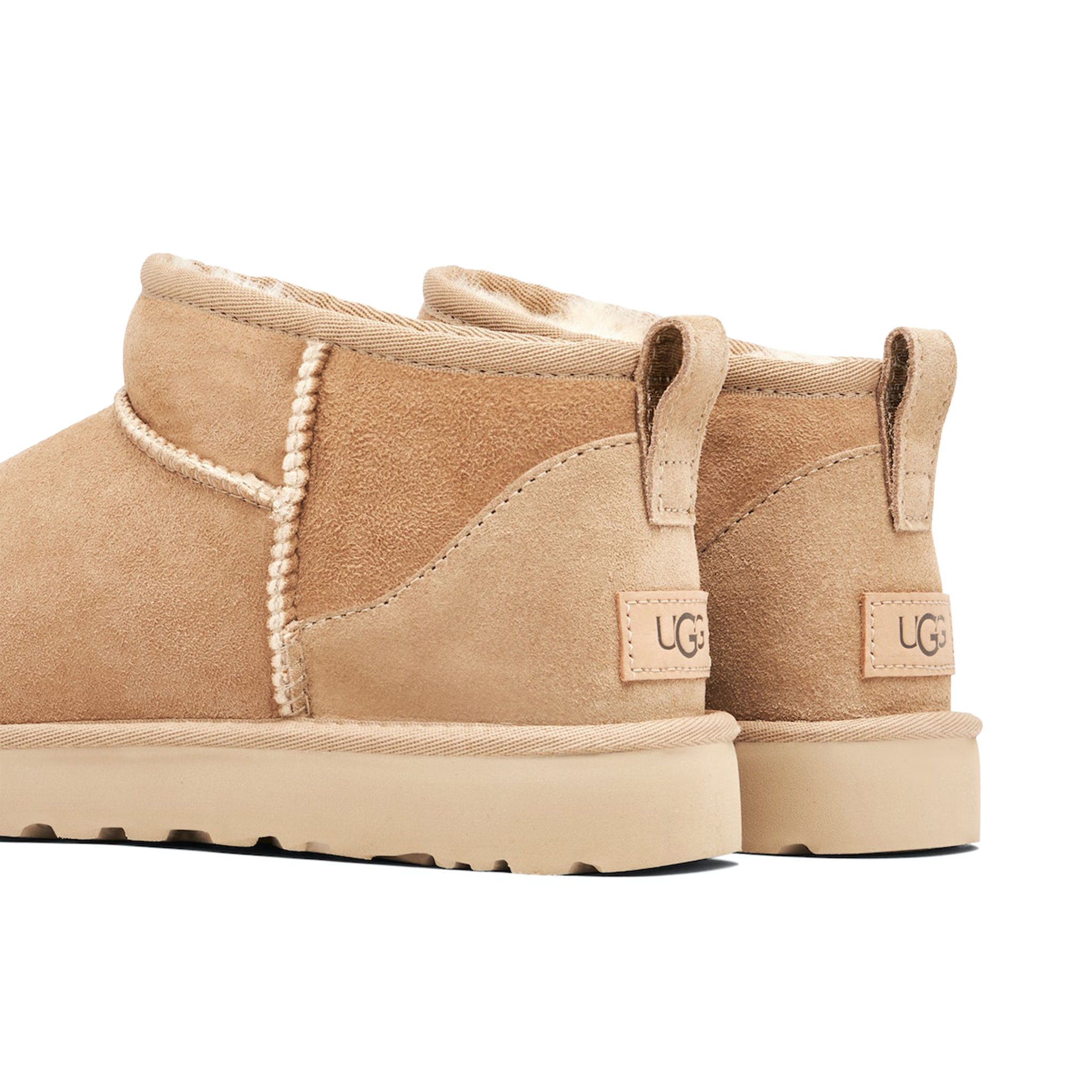 Heel view of UGG Classic Ultra Mini Sand (W) 1116109-SAN