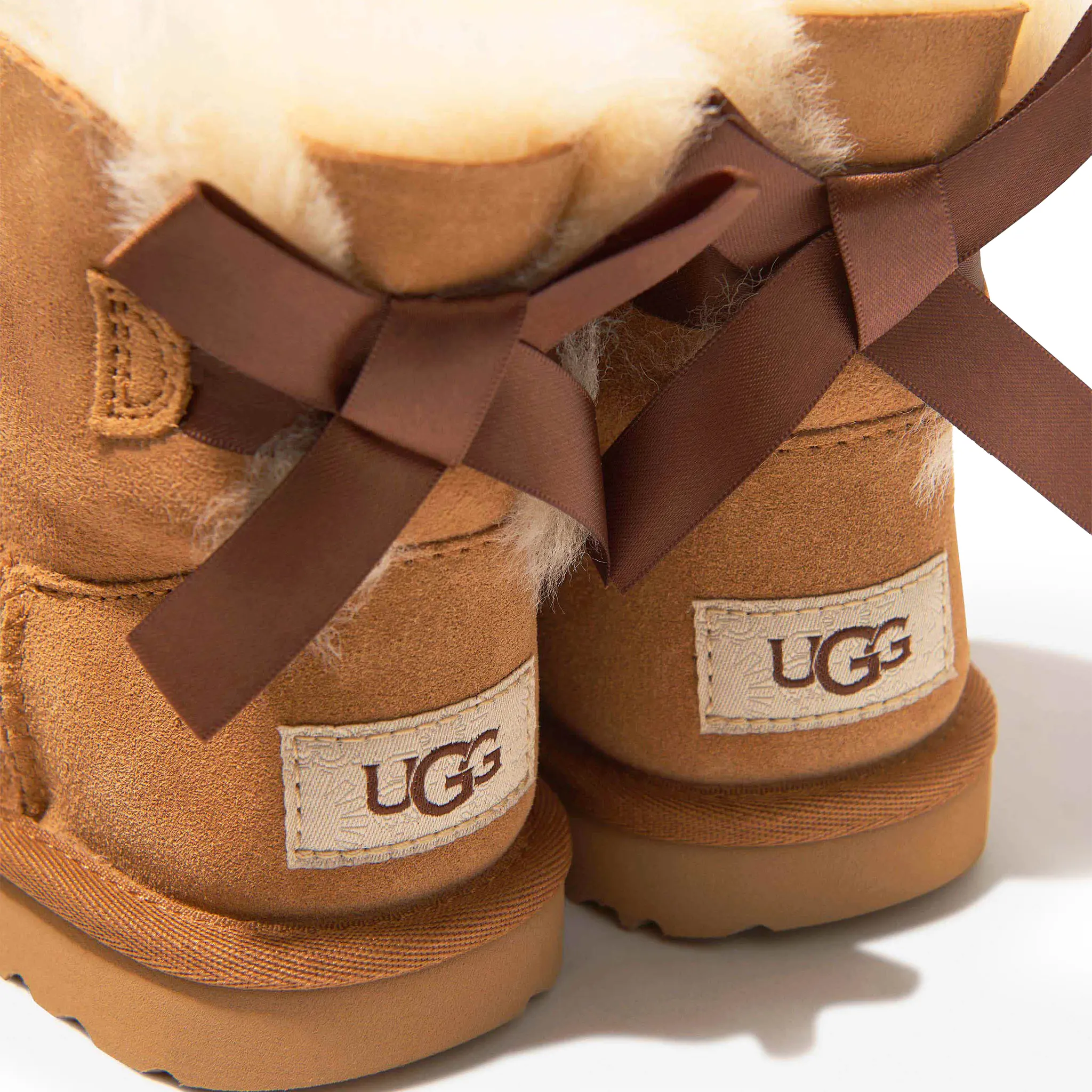 Back Side View of UGG Mini Bailey Bow II Girls Brown Boots UGGA2003101255