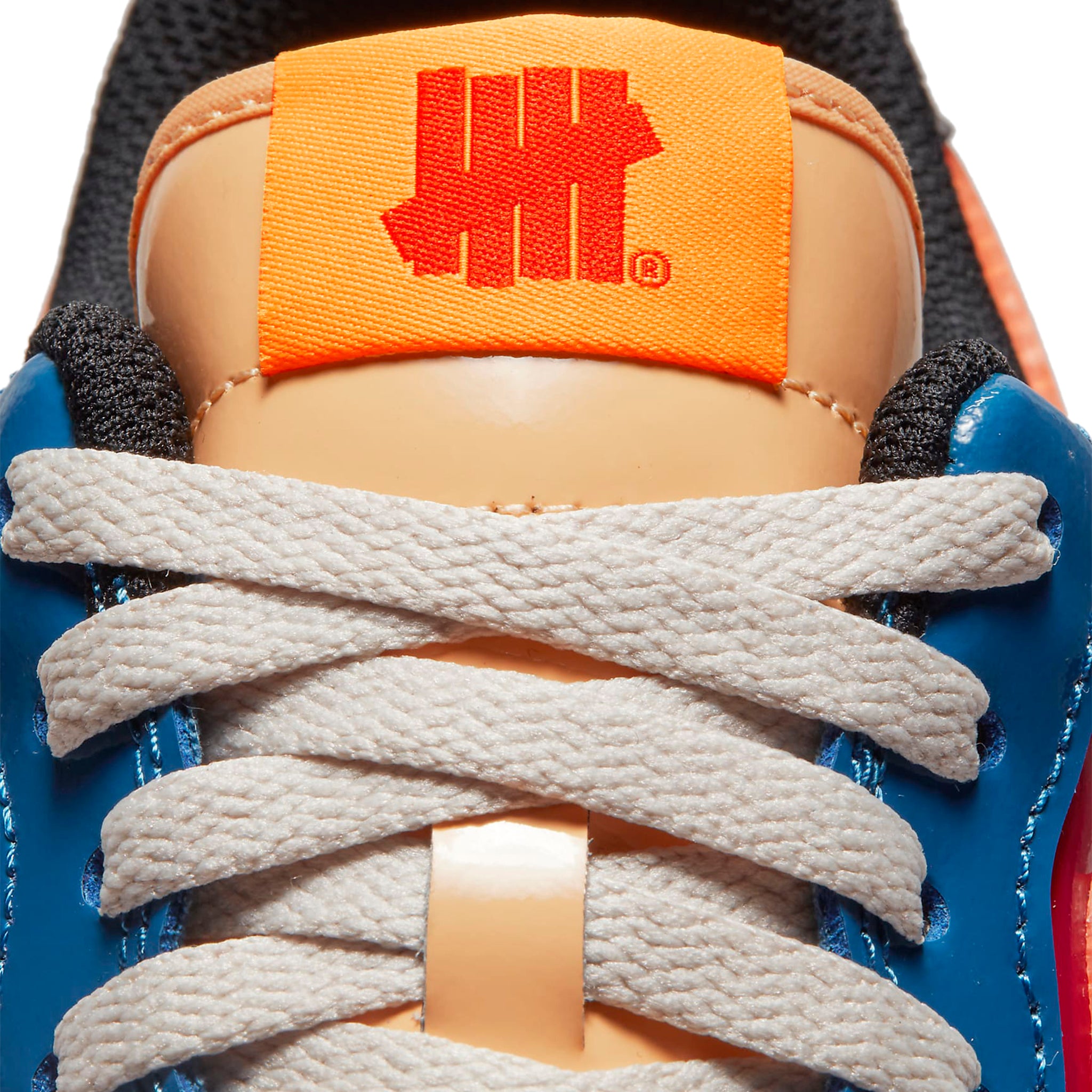 Tongue view of Undefeated x Nike Air Force 1 Low Multi-Patent DV5255-400