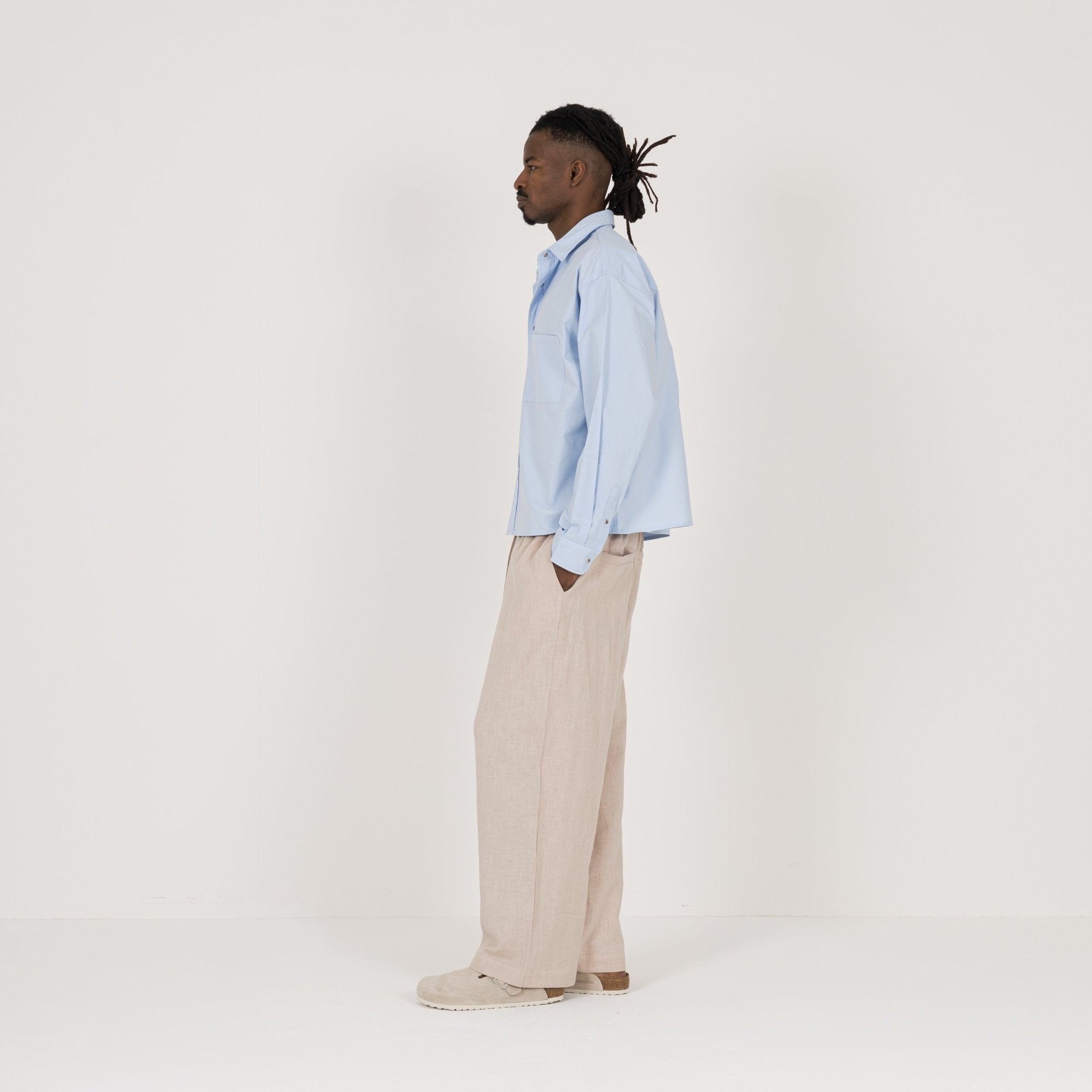 Model Side view of Destructive Uniform L/S Horizon Blue Shirt