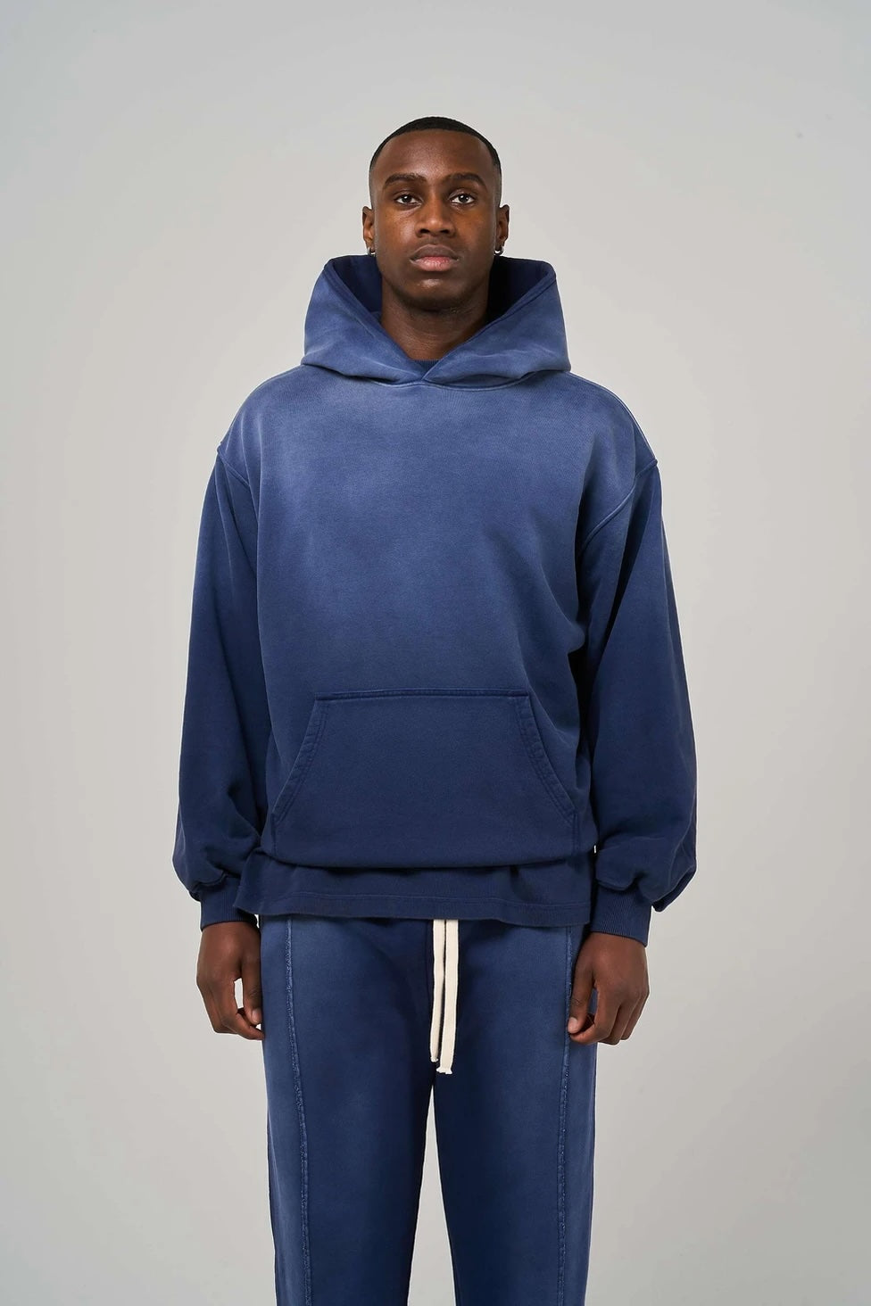 Model view of Kaizen Market Blank Heavyweight Fade Out Blue Hoodie