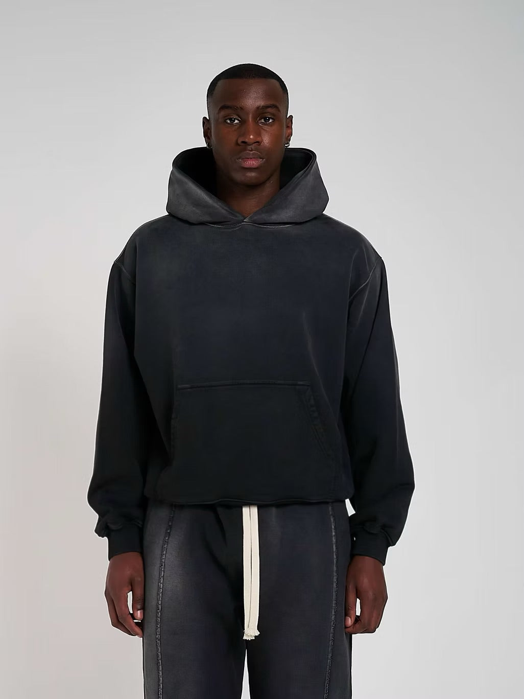 Model view of Kaizen Market Blank Heavyweight Fade Out Black Hoodie