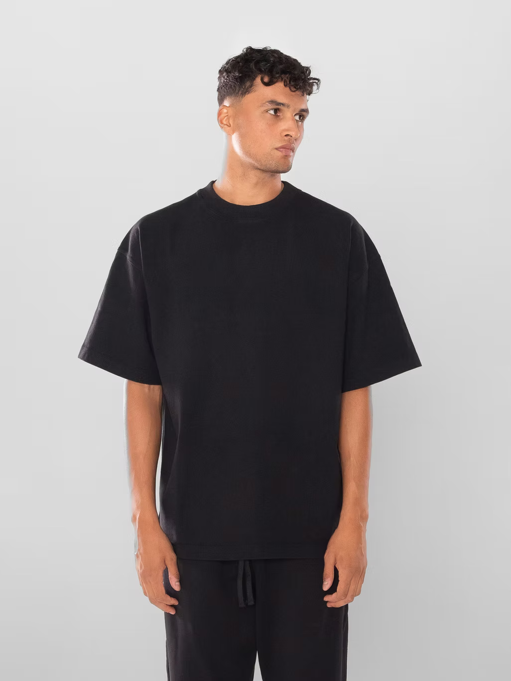 Model view of Kaizen Market Blank Heavyweight Black T-shirt