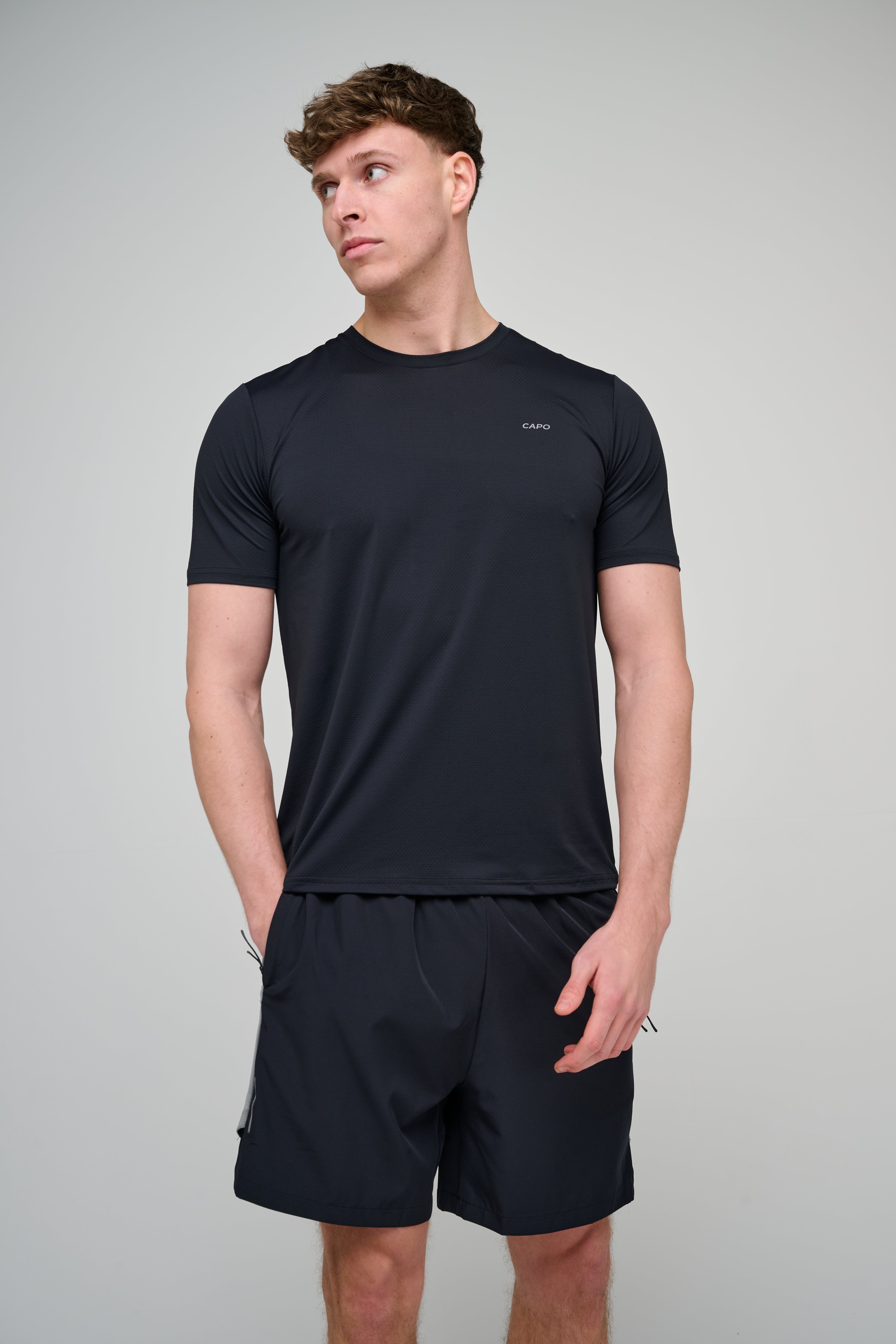 Model view of CAPO Active Performance Black Shorts