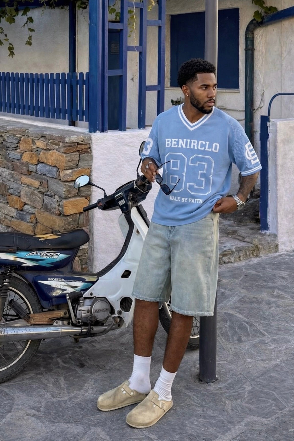 Model  view of Benir Clothing God's Timing 83 Knit Light Blue T-shirts