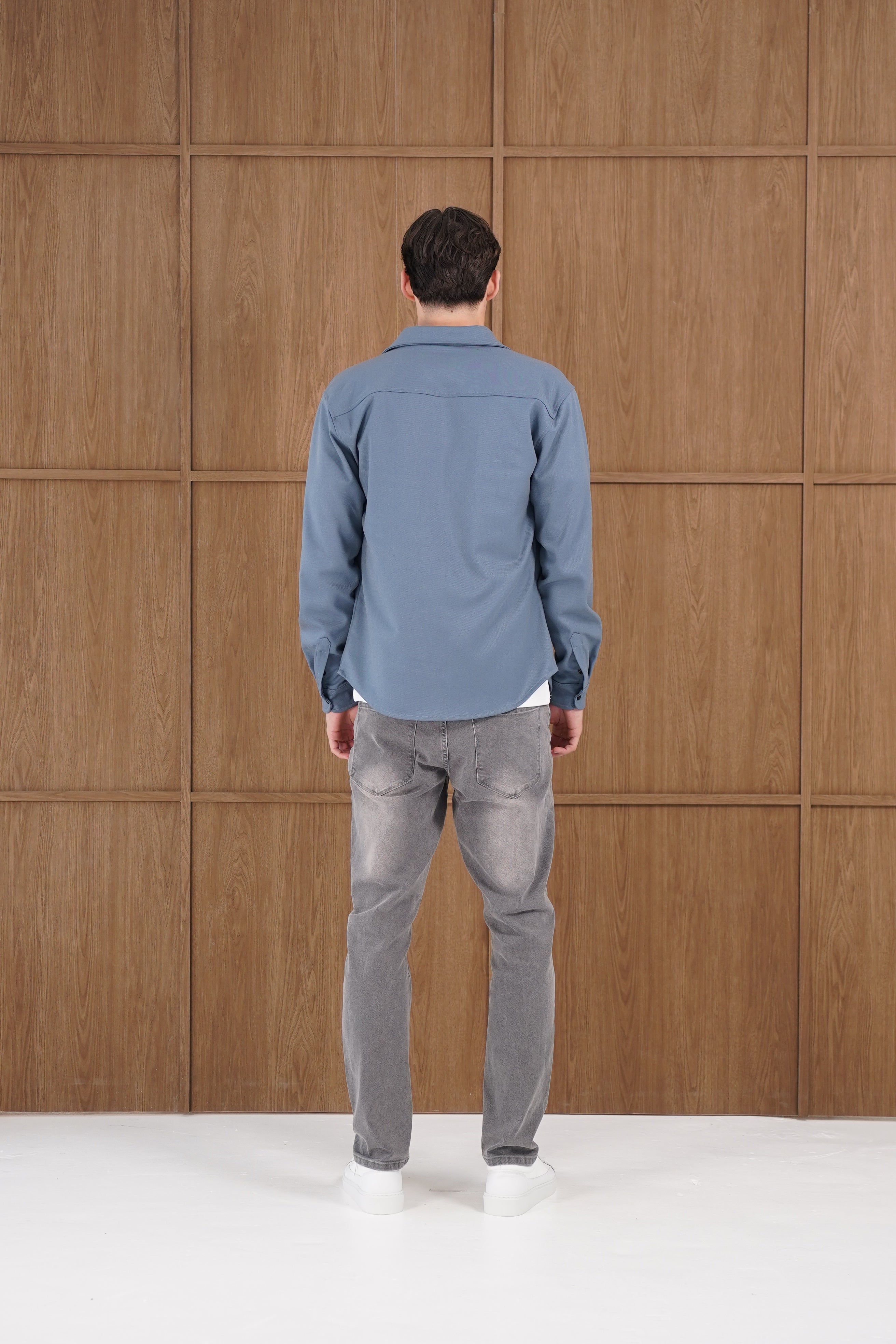Model back view of CAPO Steel Blue Overshirt