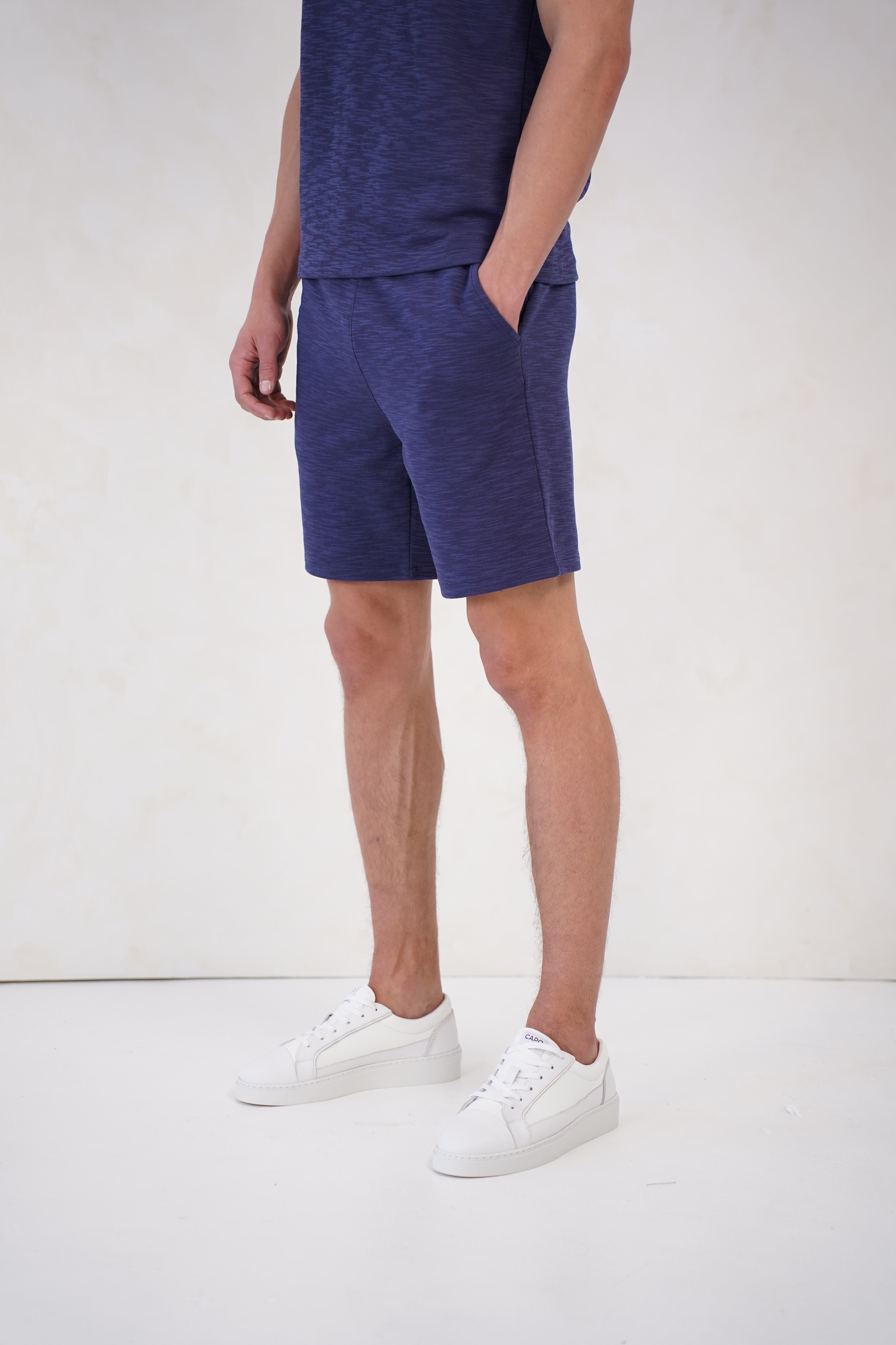 Side view of CAPO Jersey Slub Navy Shorts