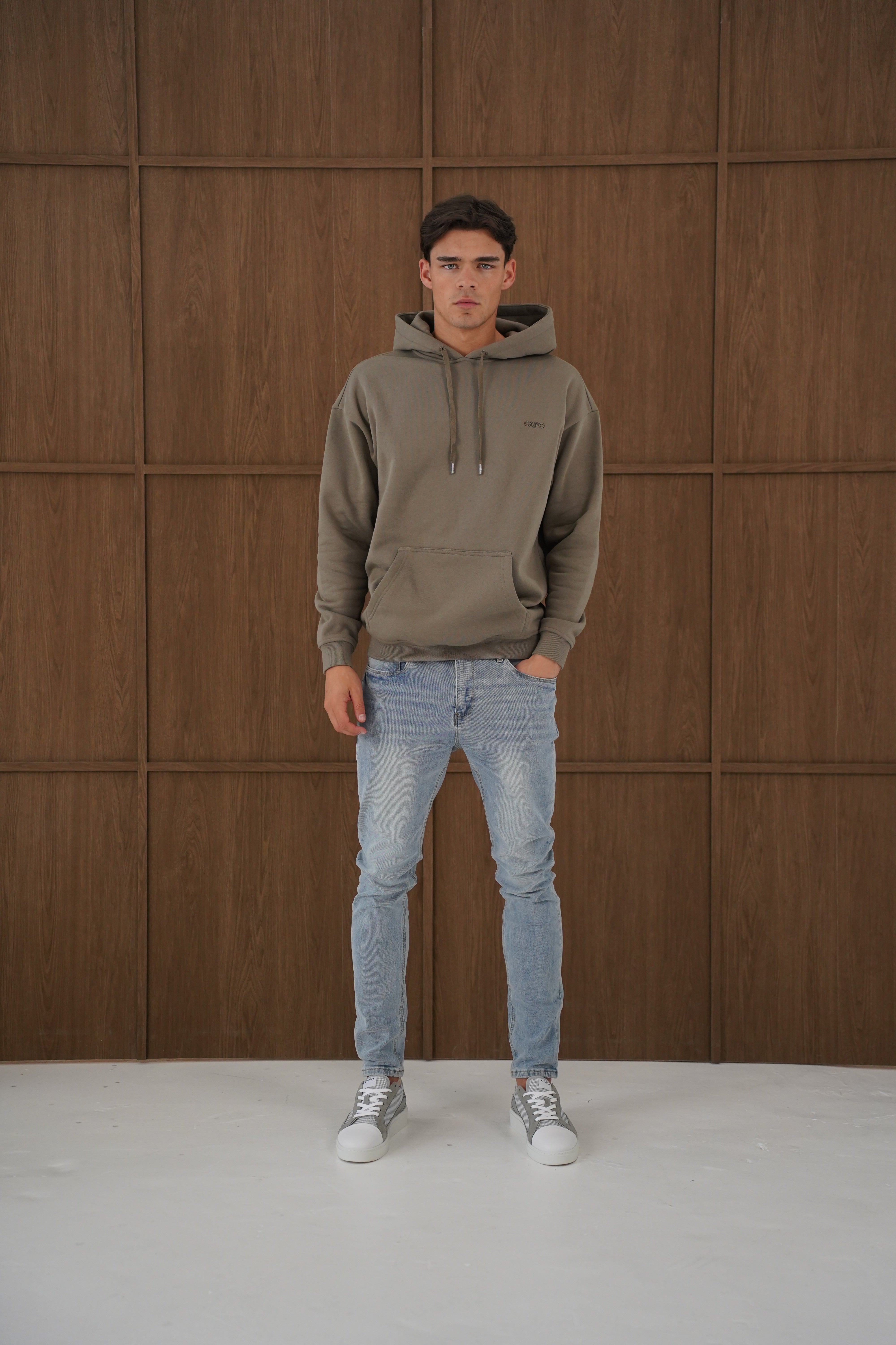 Model view of CAPO Tracksuit Overhead Olive Hoodie