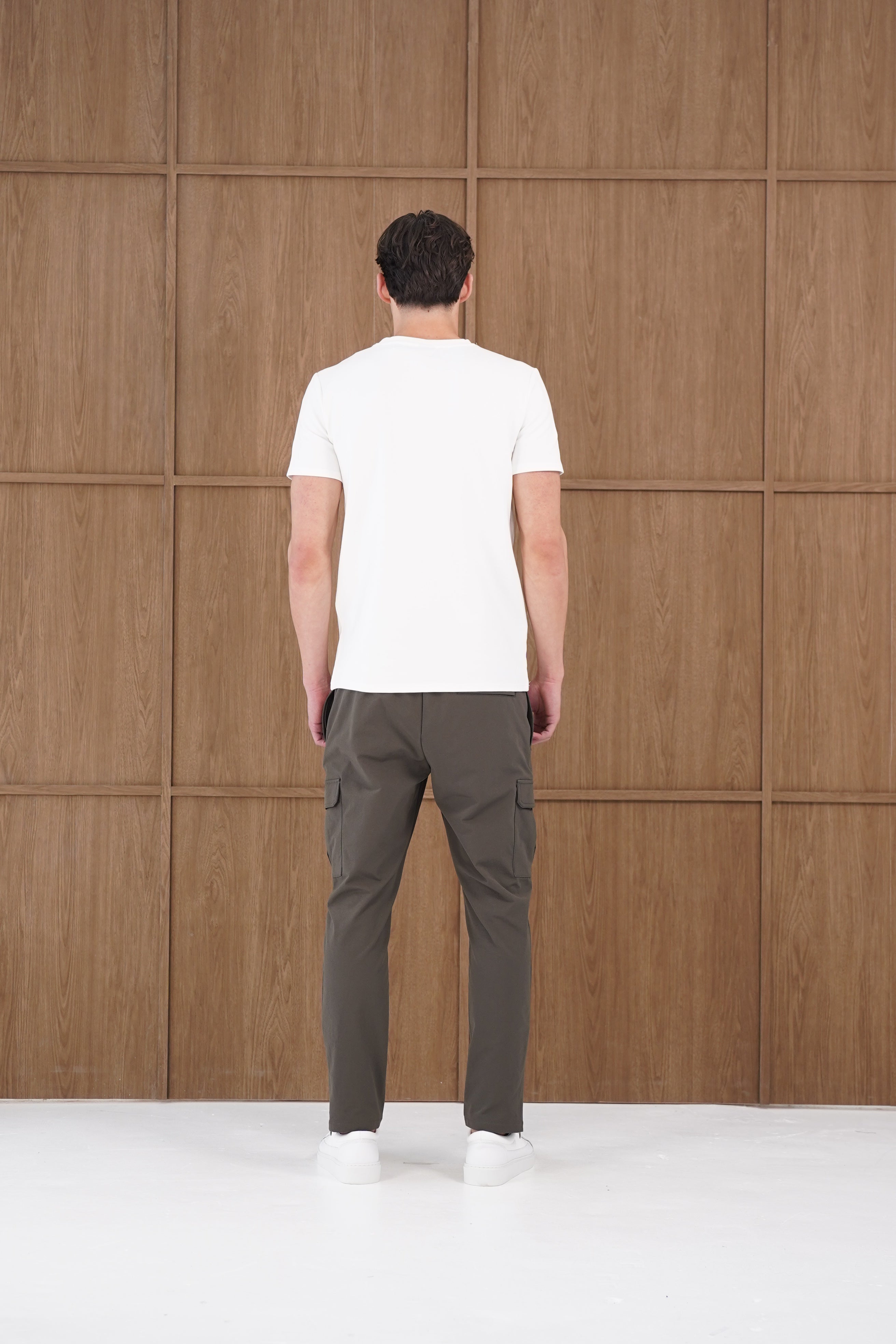 Model back view of CAPO Utility Regular Khaki Cargo Pants 
