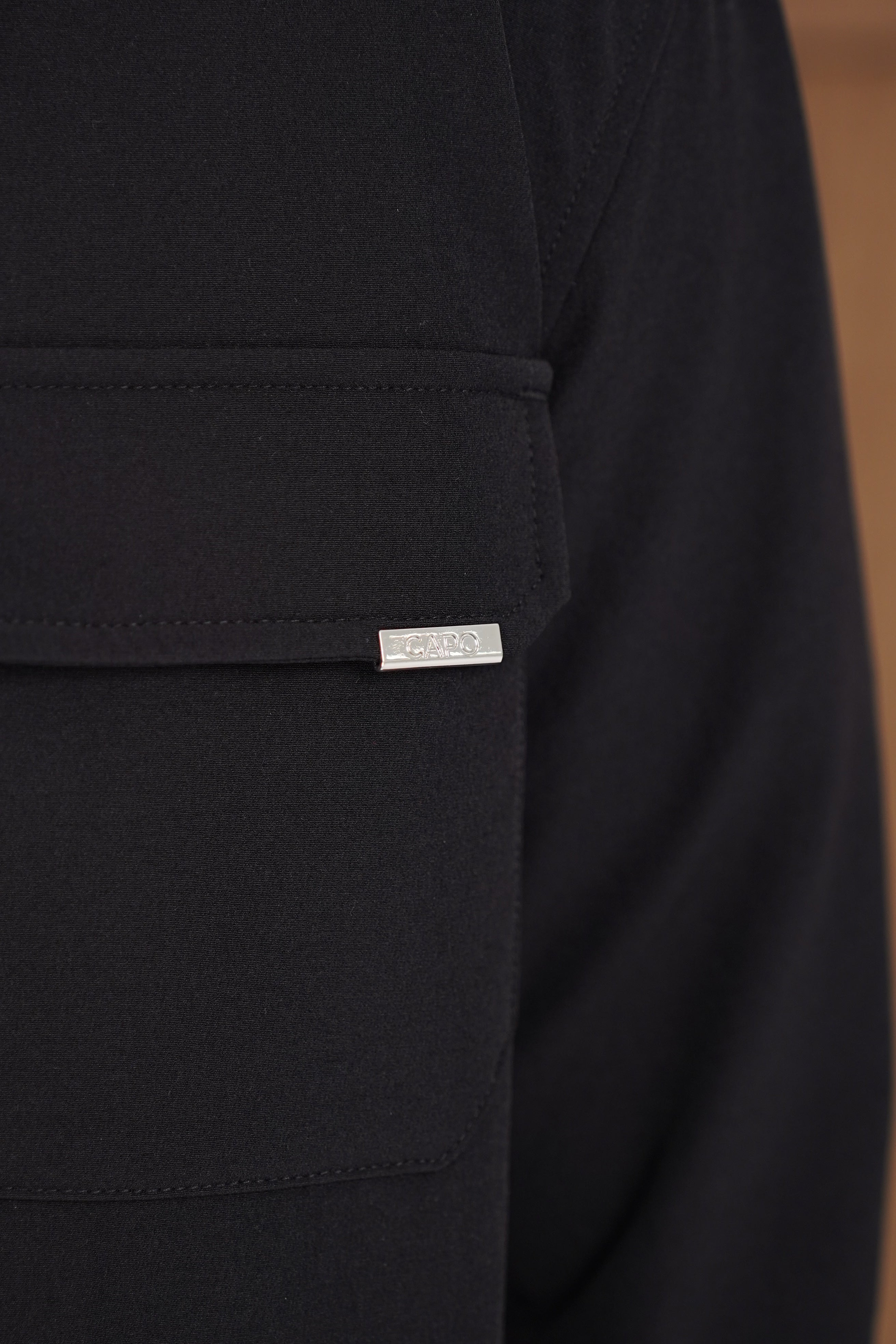 Detail view of CAPO Utility Black Overshirt