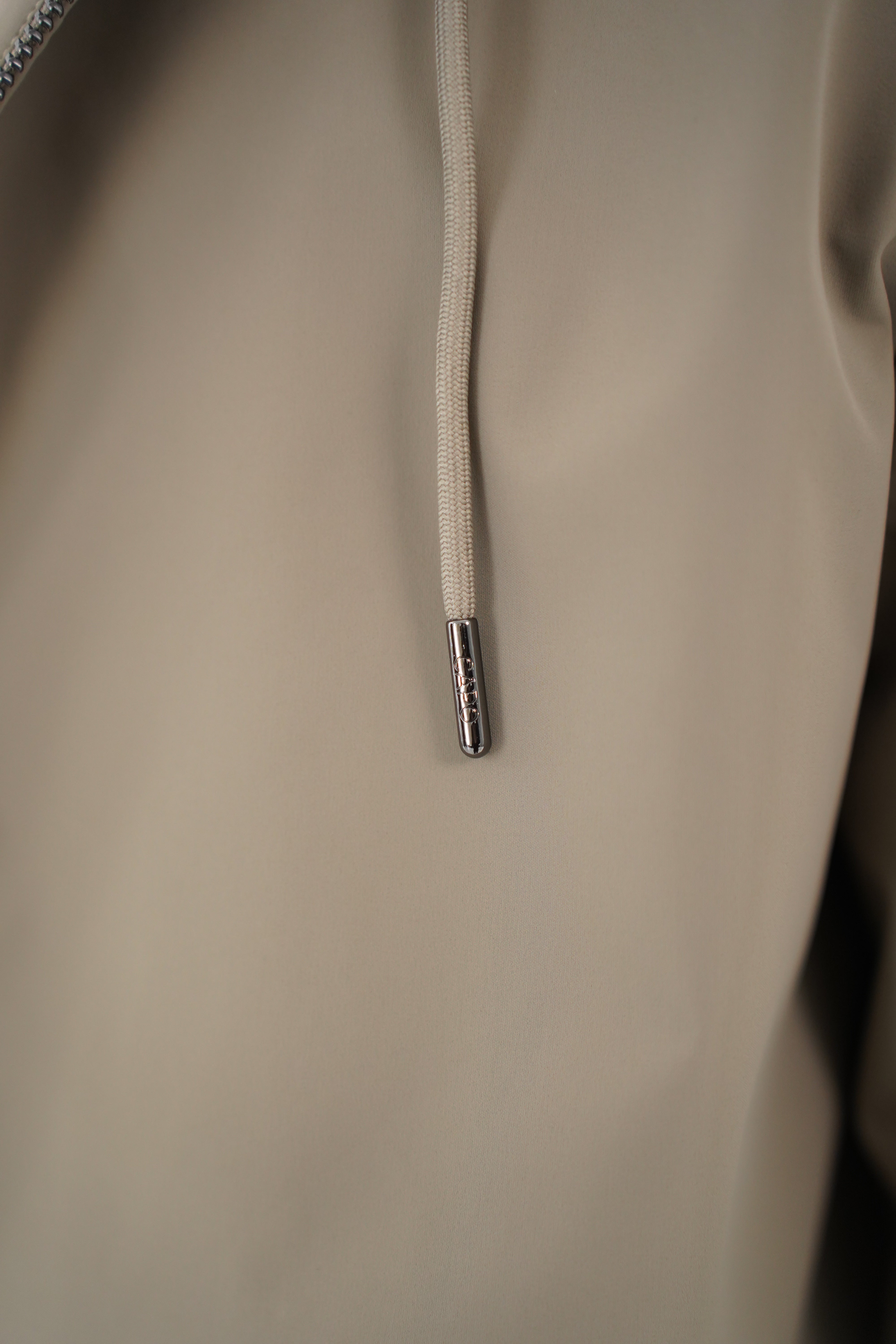 Detail view of CAPO Lightweight Shell Olive Jacket
