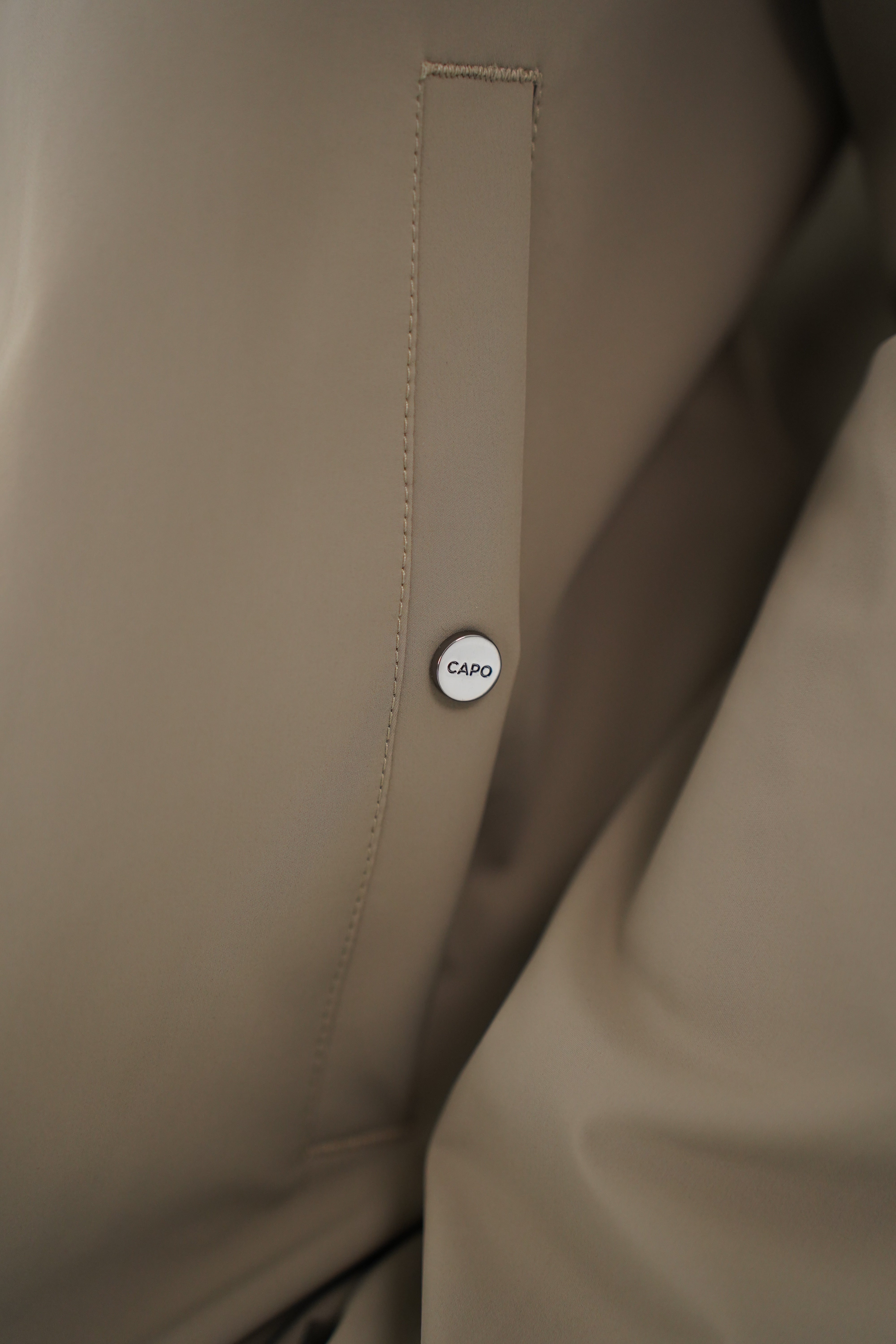Pocket detail view of CAPO Lightweight Shell Olive Jacket