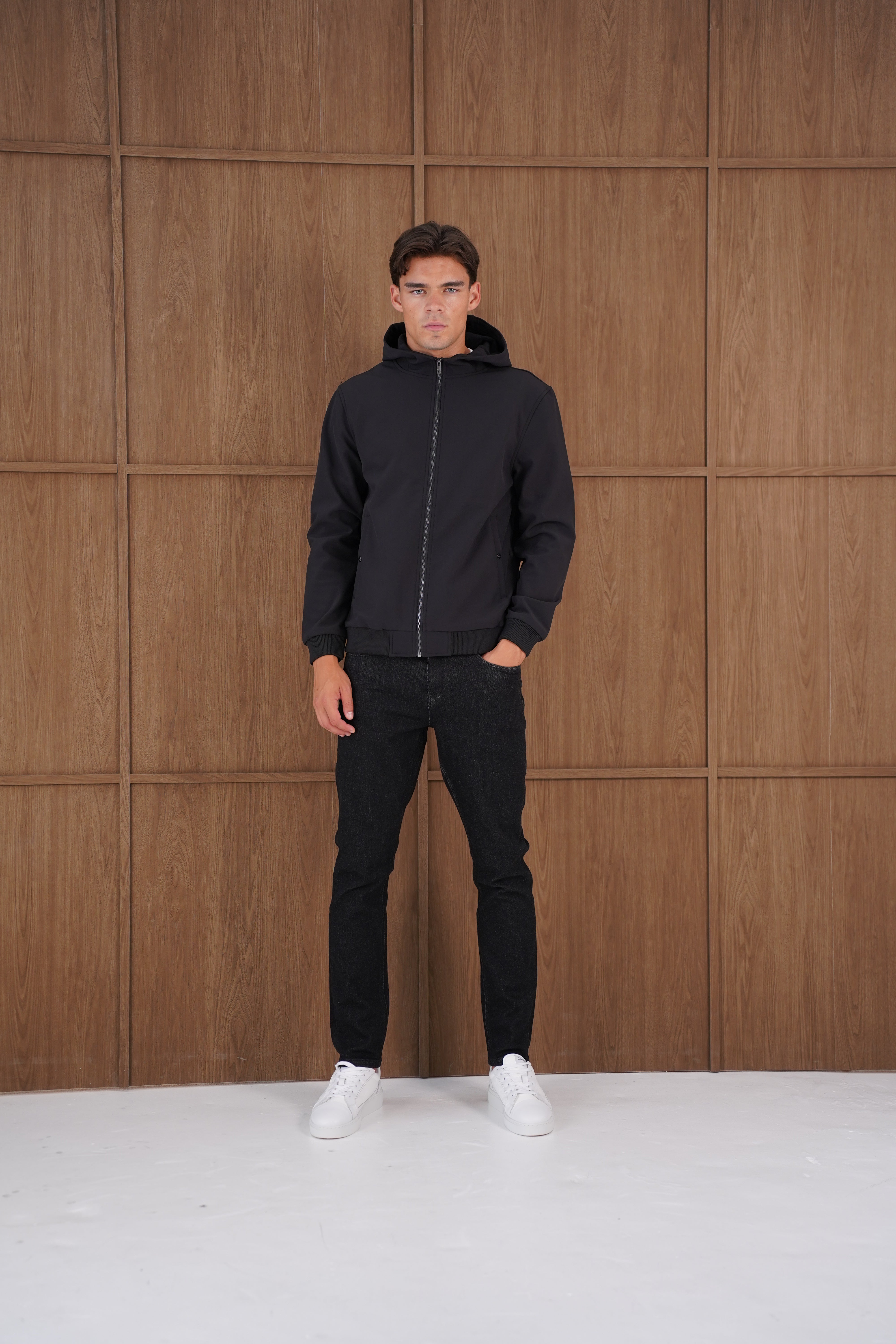 Model view of CAPO Soft Shell Hood Black Jacket