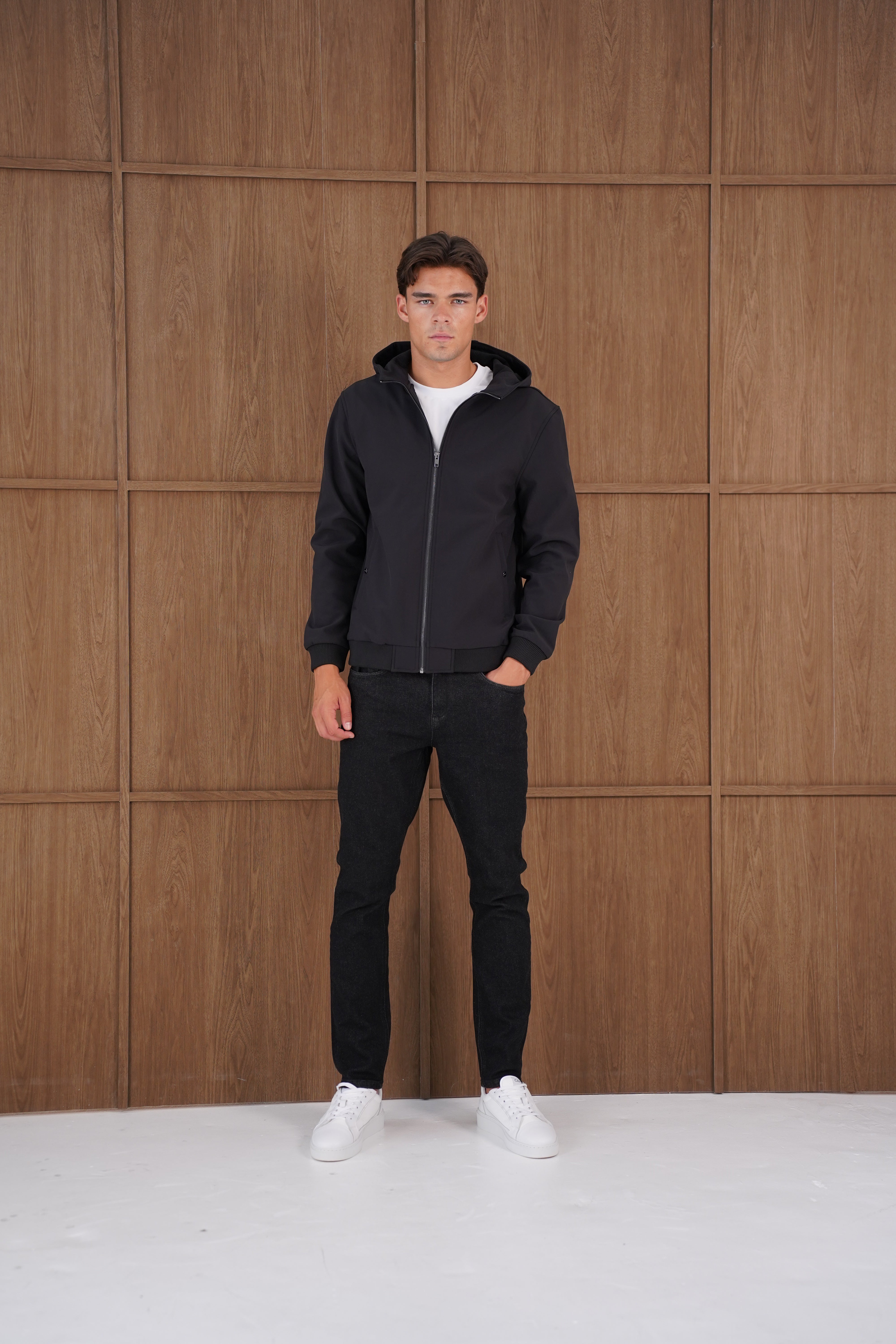 Model view of CAPO Soft Shell Hood Black Jacket