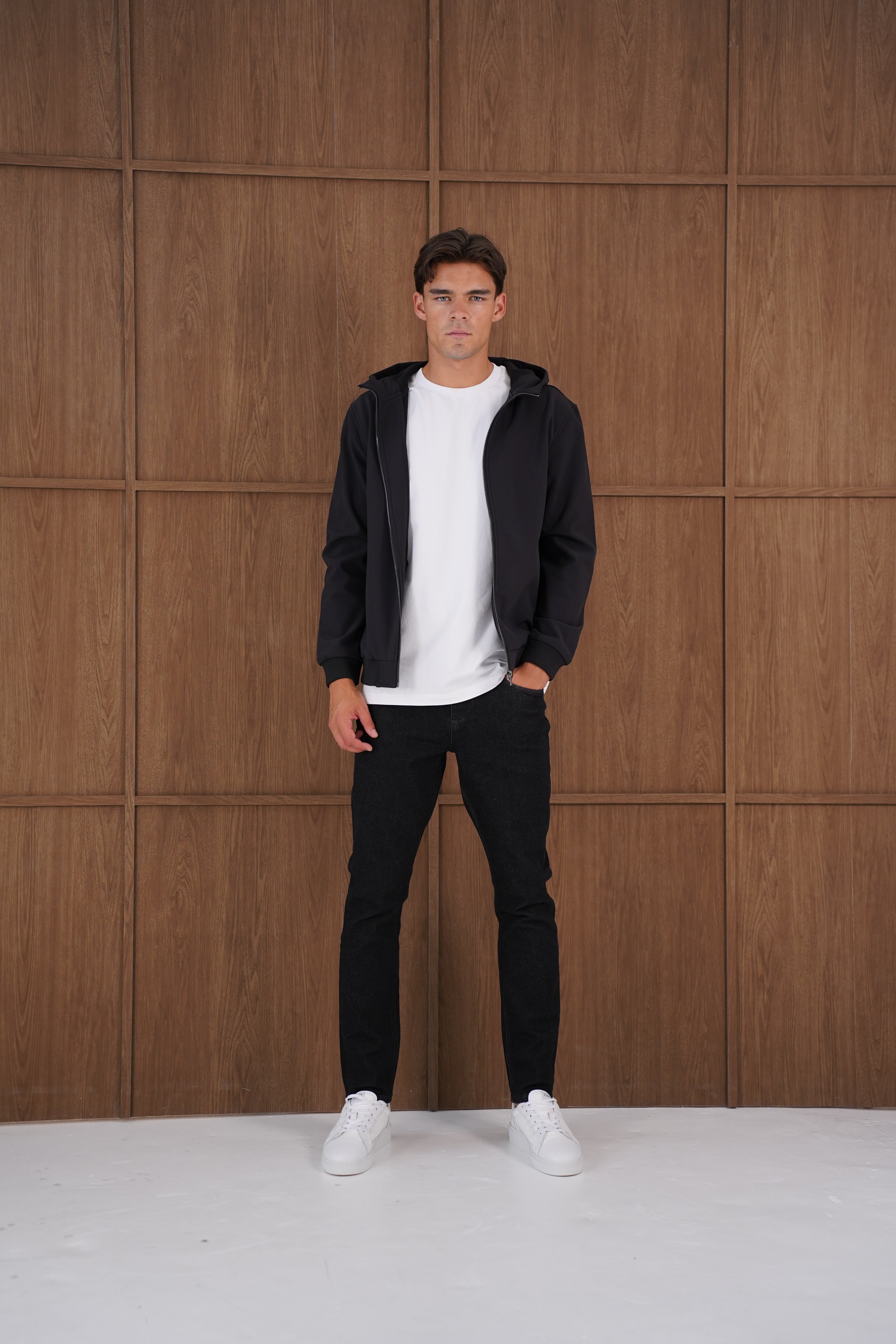 Model view of CAPO Soft Shell Hood Black Jacket