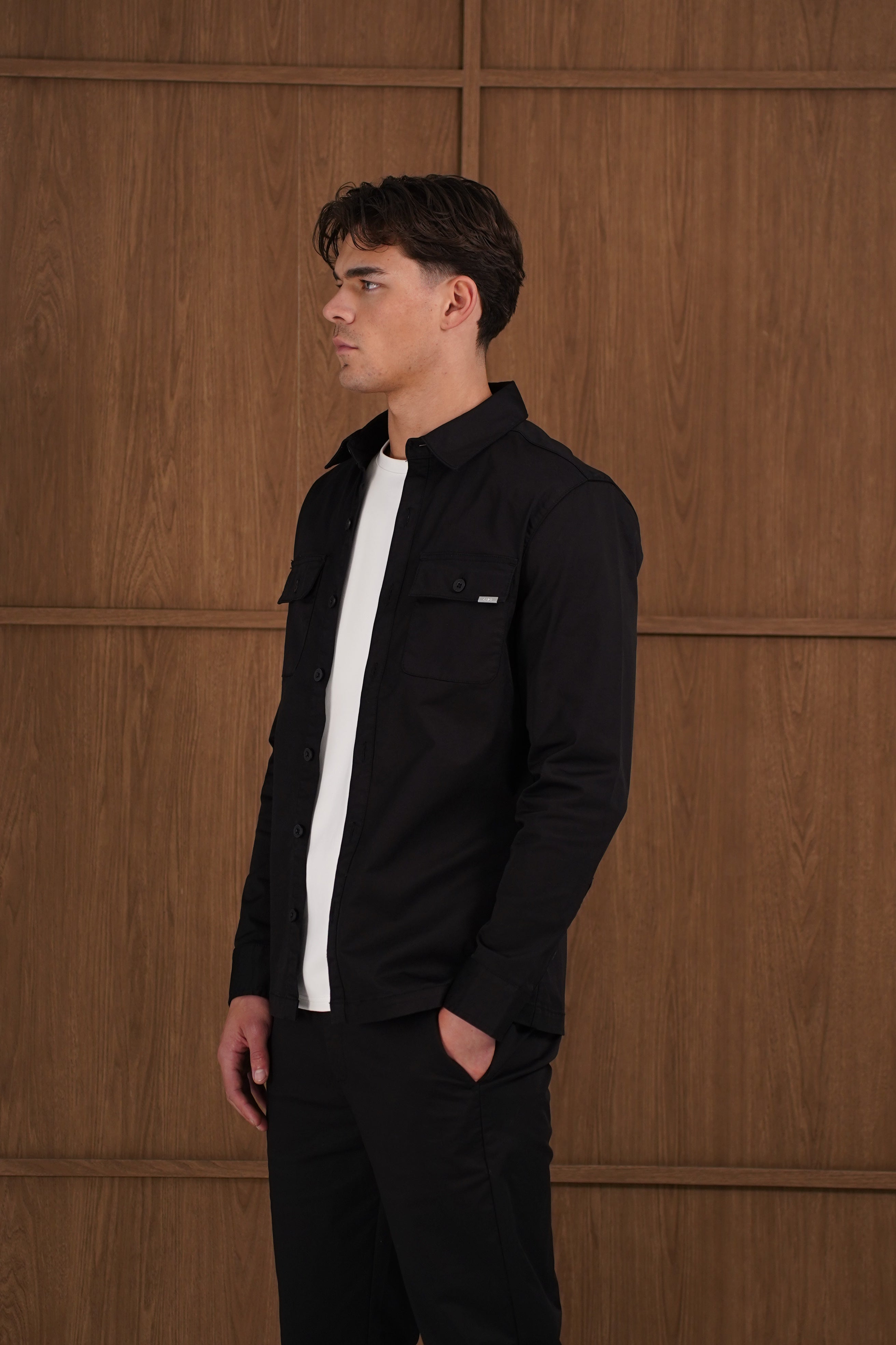 Model Side view of CAPO Cotton Cargo Black Overshirt