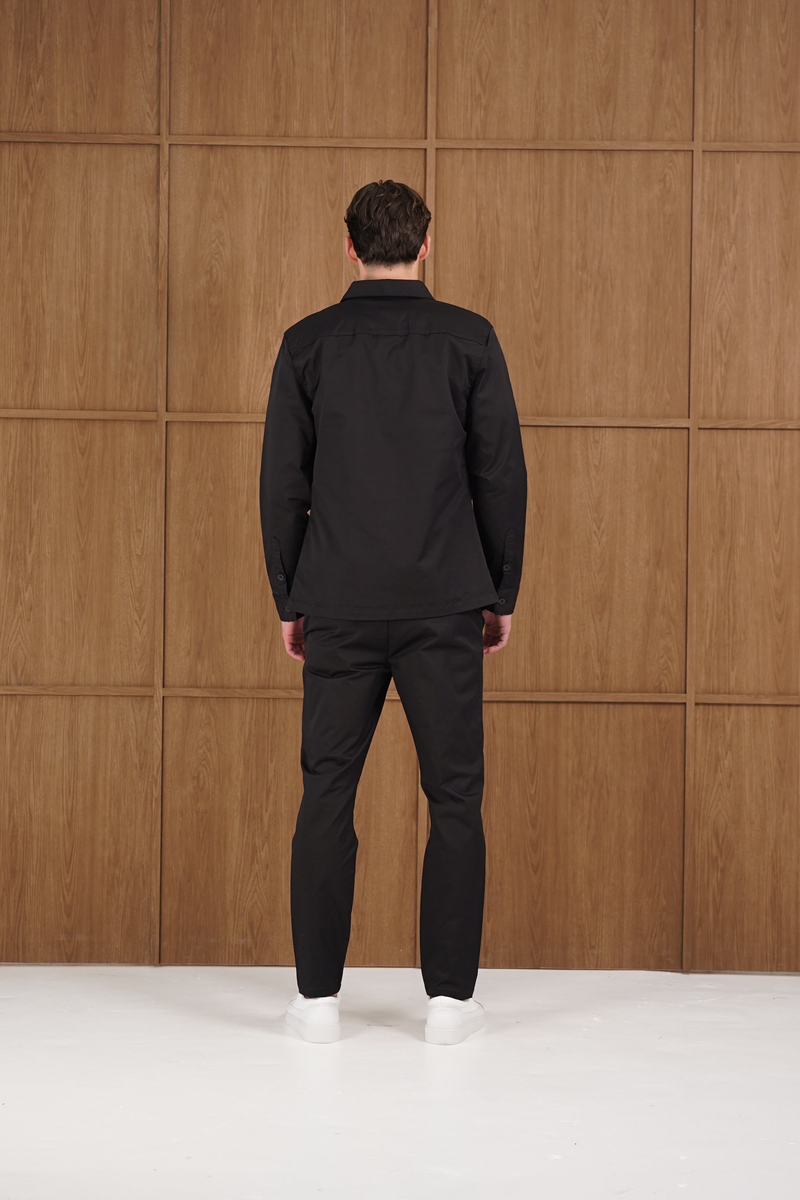 Model back view of CAPO Cotton Cargo Black Overshirt