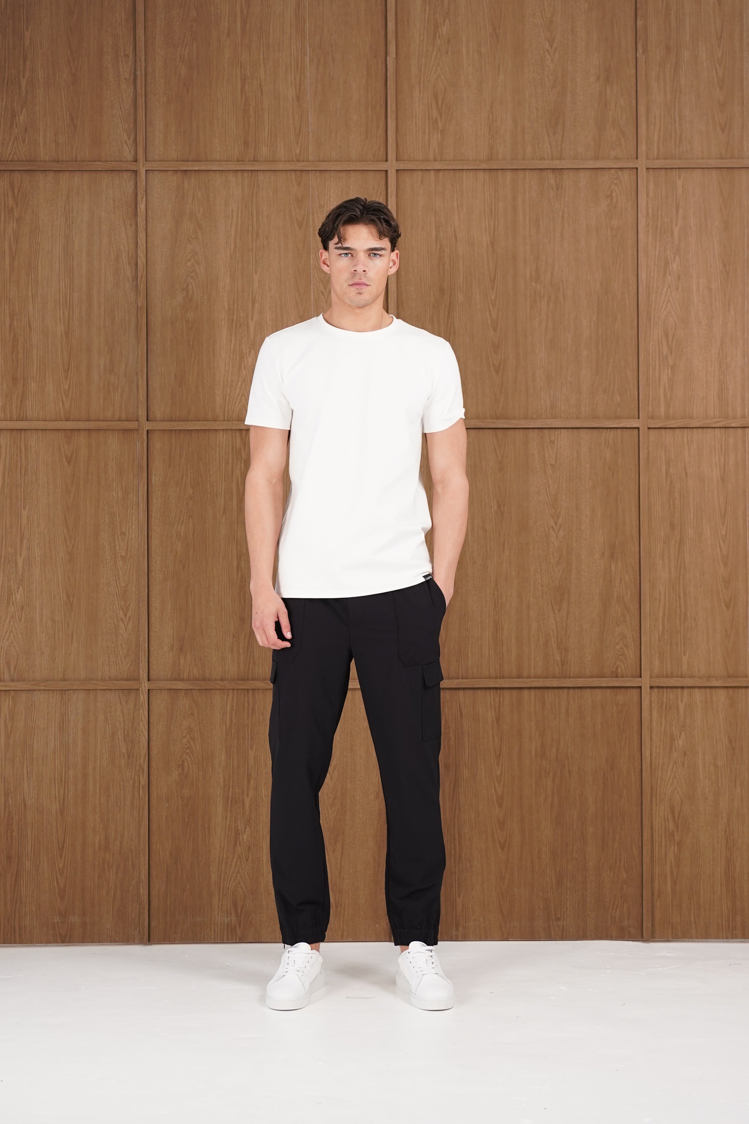 Model view of CAPO Smart Cuffed Black Cargo Pants