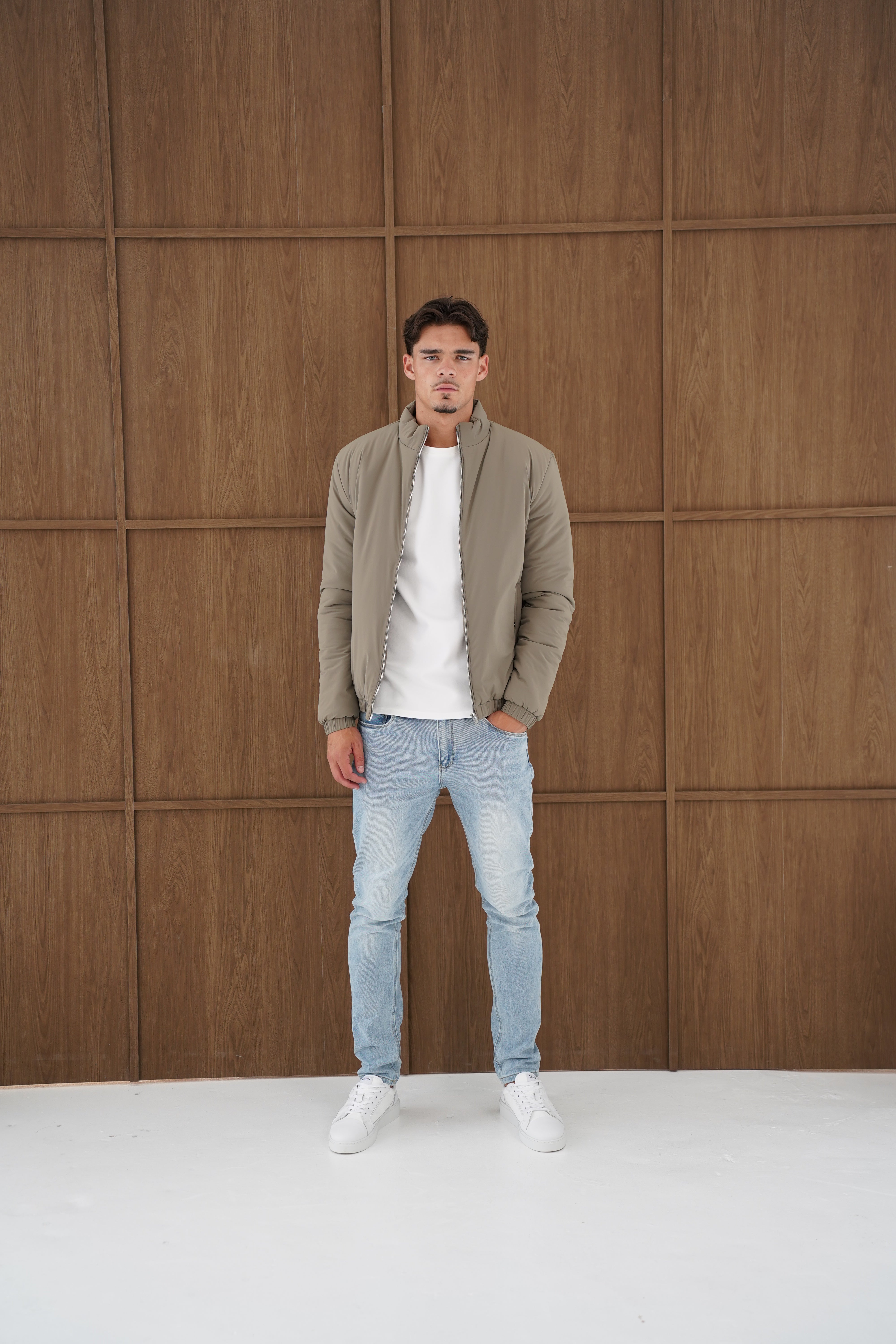 Model front view of CAPO Padded Olive Bomber Jackets