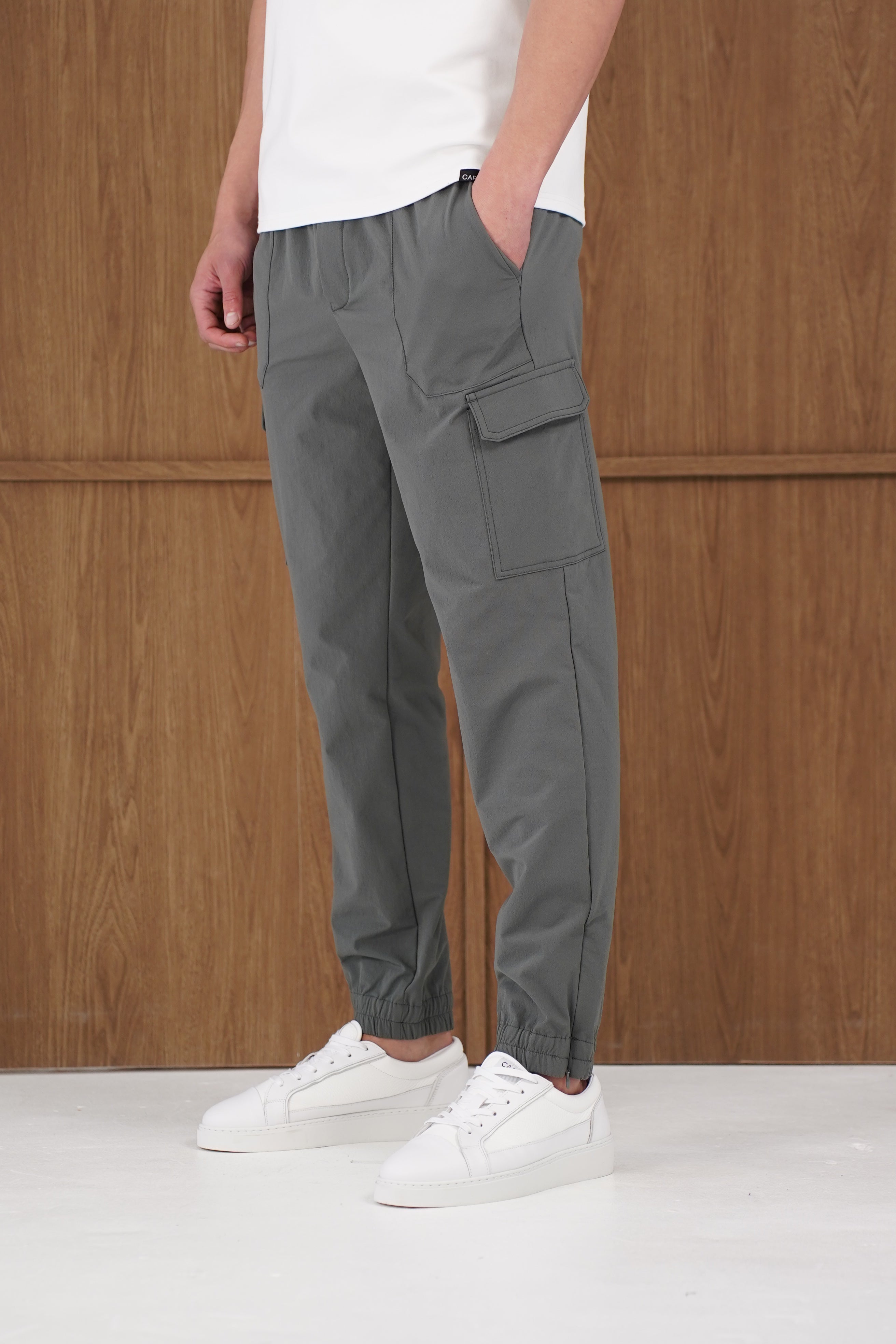 Side view of CAPO Smart Cuffed Charcoal Cargo Pants