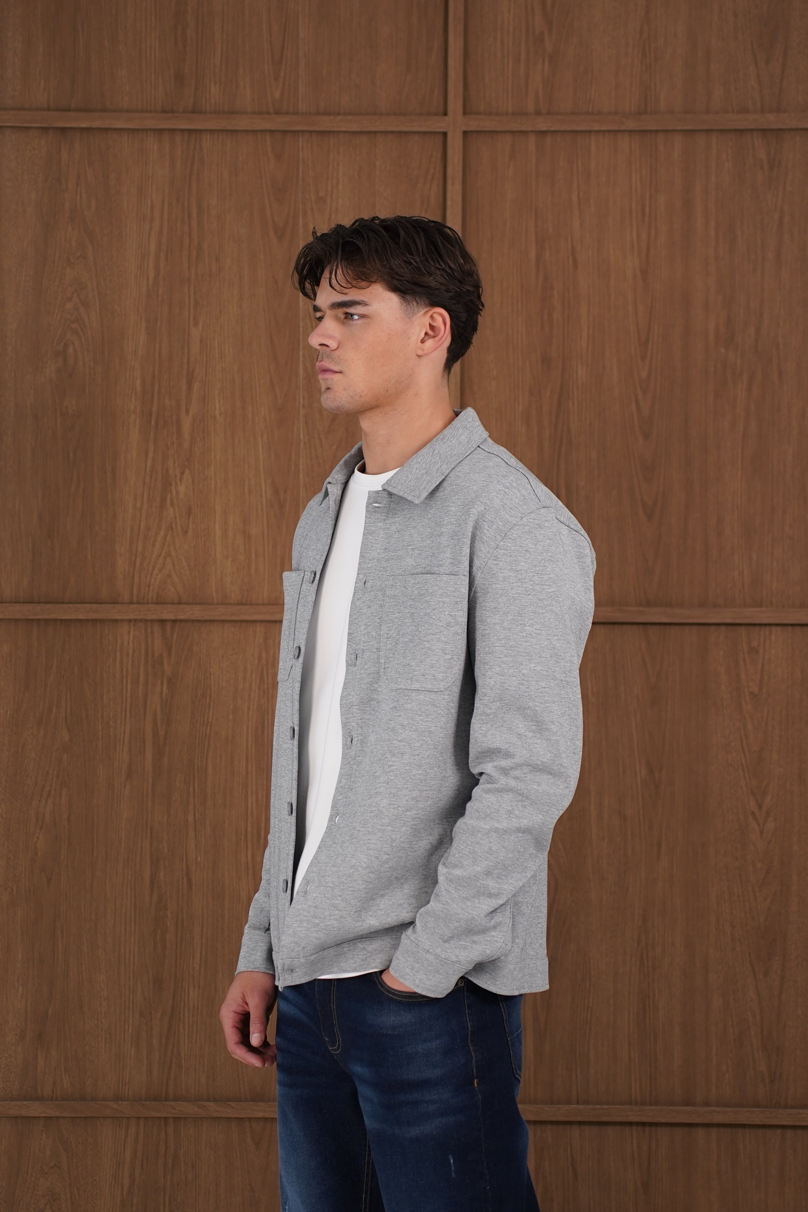 Model side view of CAPO Smart Button Light Grey Overshirt